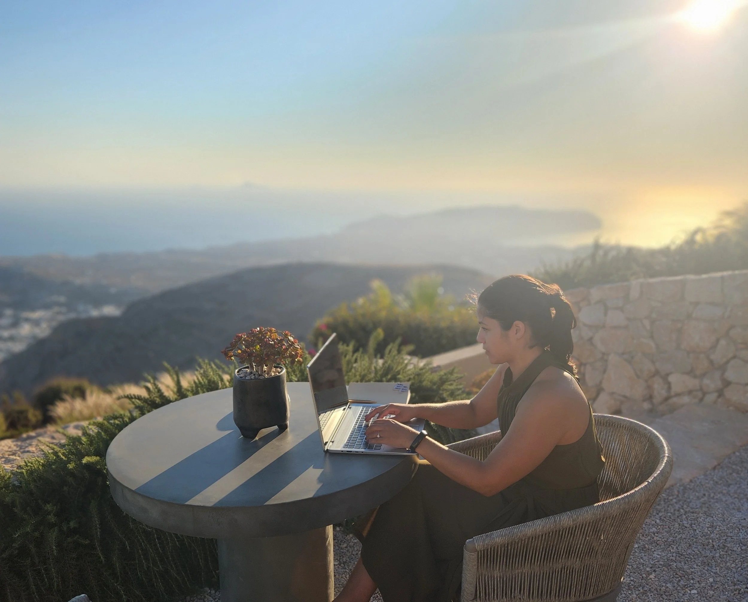 Woman reflecting on finances and mental health, representing financial therapy support