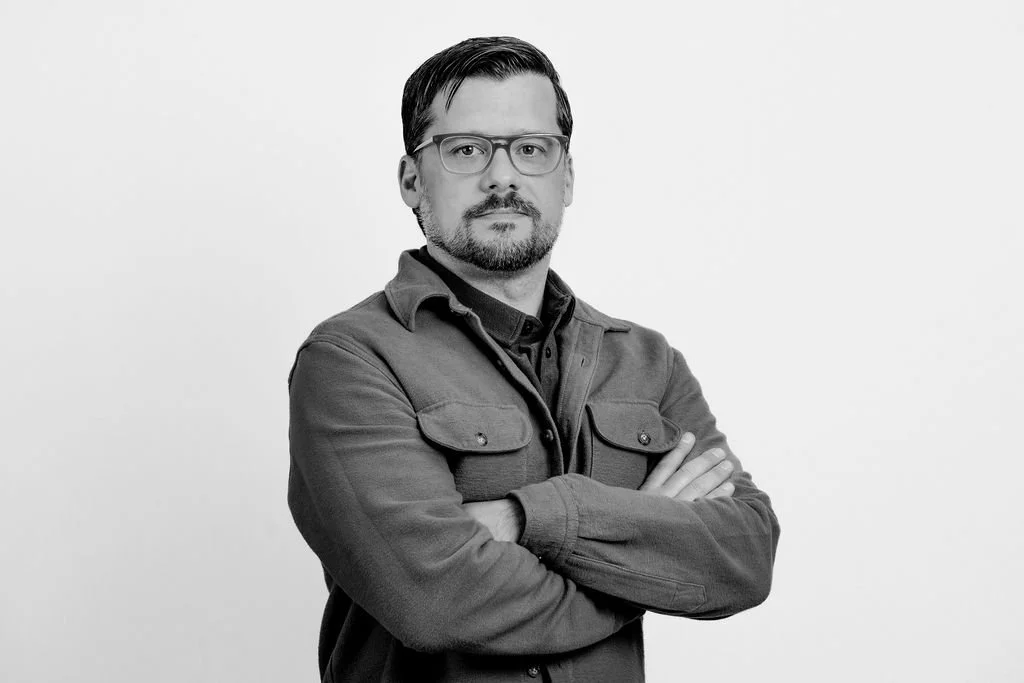 <b>Zack Woods</b><br/>Studio Director