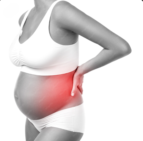 a pregnant woman is shown with her hand on her back, while a red highlight indicates pain in that area.