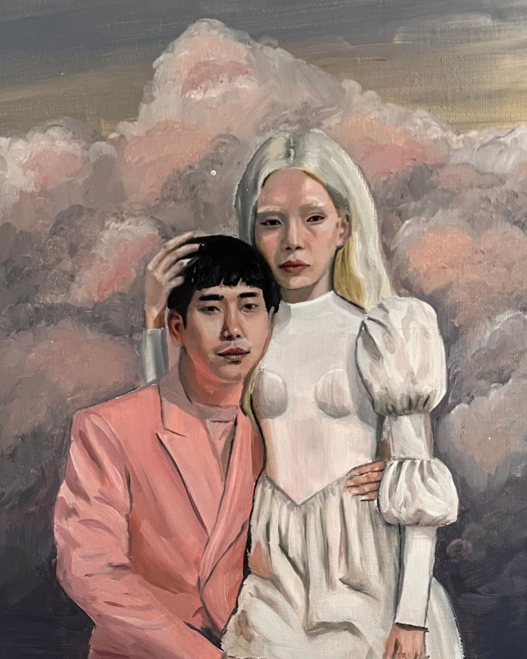 A painting of a woman with long blonde hair and a man with black hair, both dressed in vintage-style clothing, standing in front of a cloudy sky background.
