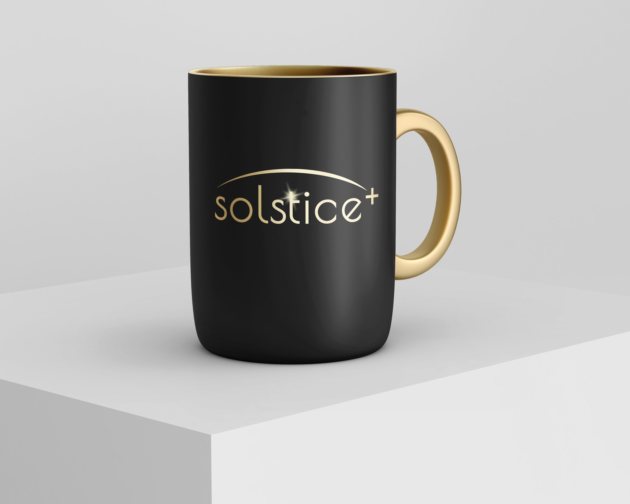 black mug with gold highlights and the Solstice Plus logo on the front