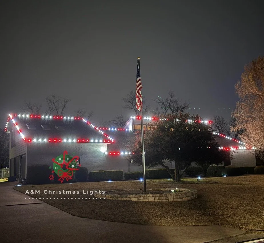 A house decorated with Christmas lights; a flagpole with an American flag in the front yard; a Christmas tree graphic with decorations and a bow, with text "A&M Christmas Lights."