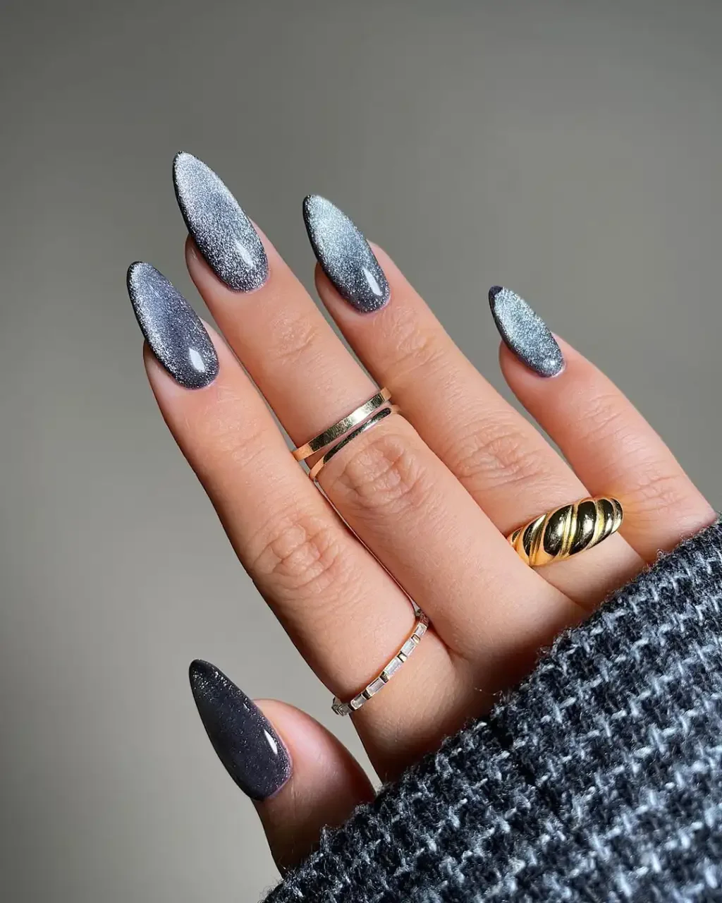 long-silver-black-cat-eye-nails.webp