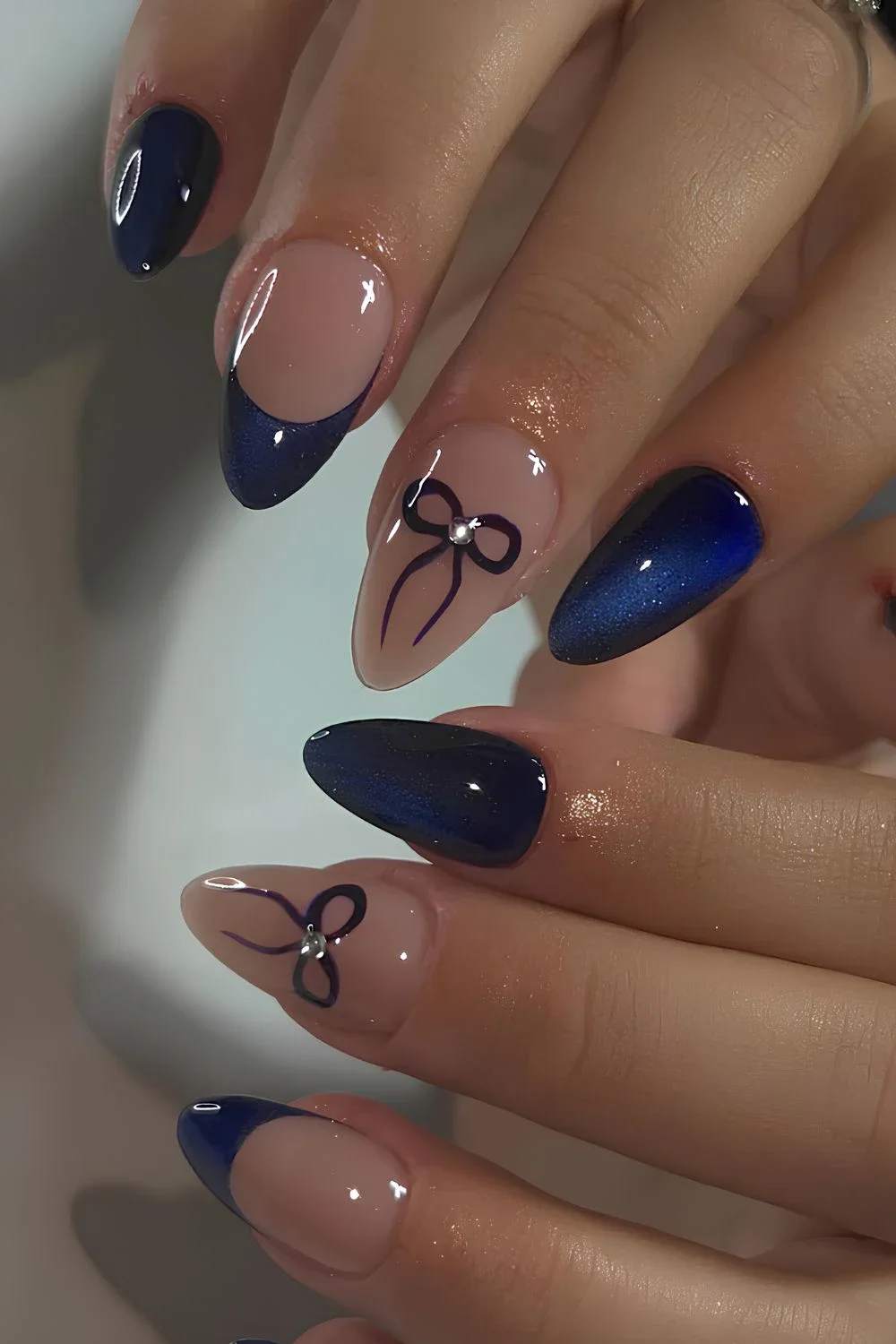 Dark-blue-cat-eye-effect-nails.jpg.webp