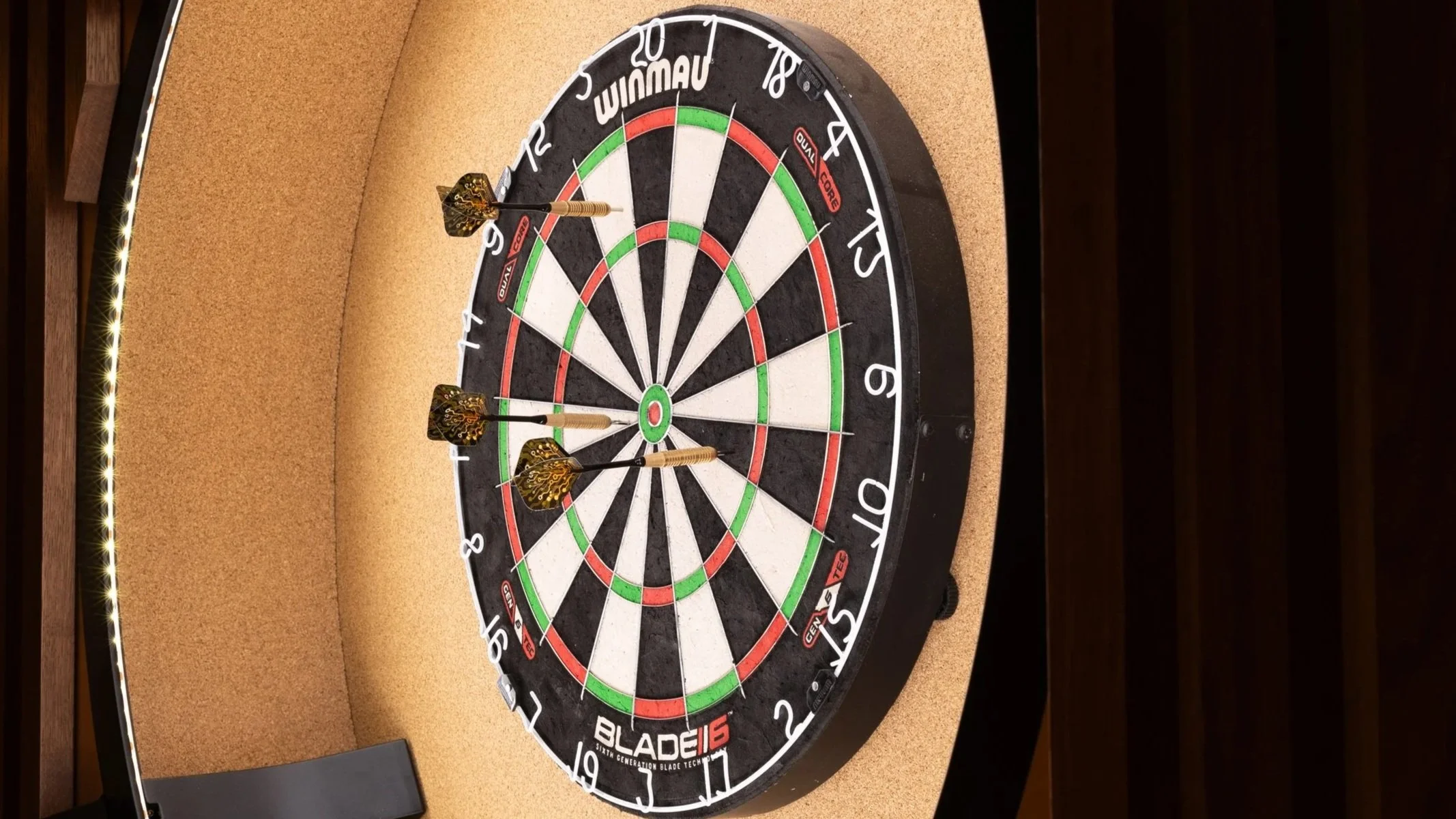 Image of dartboard with darts.