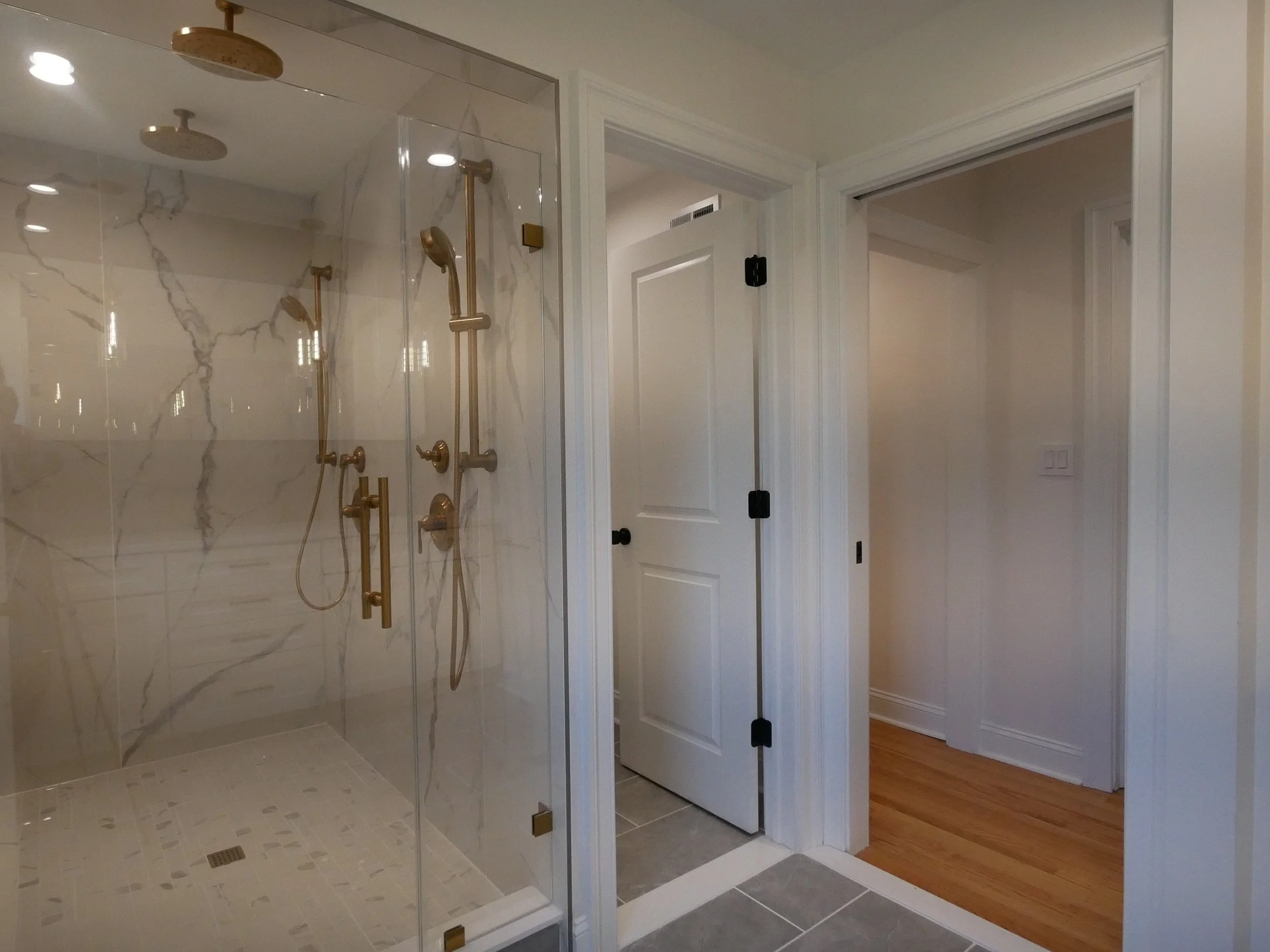 Primary bath shower and toilet room