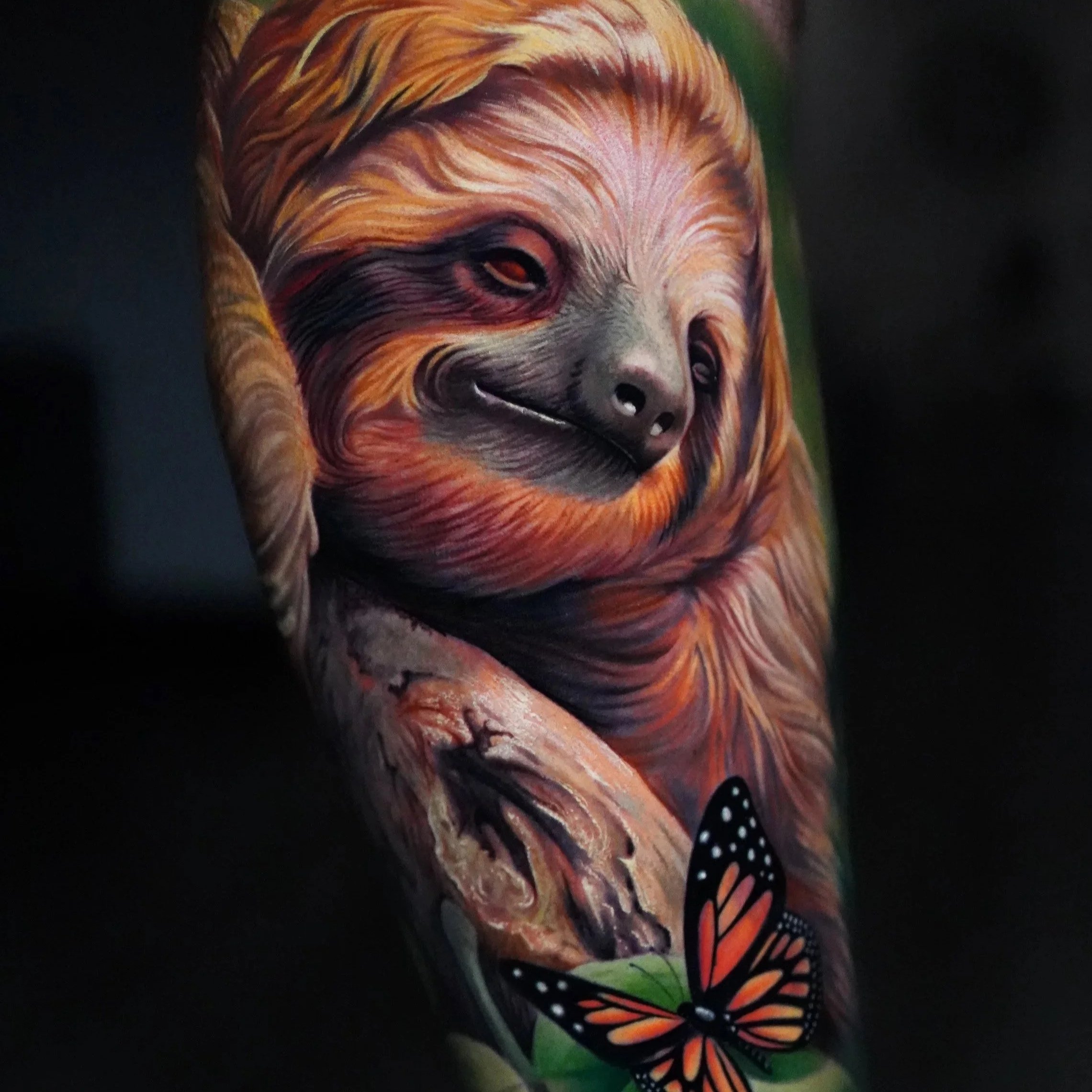 Sloth full-color realism tattoo