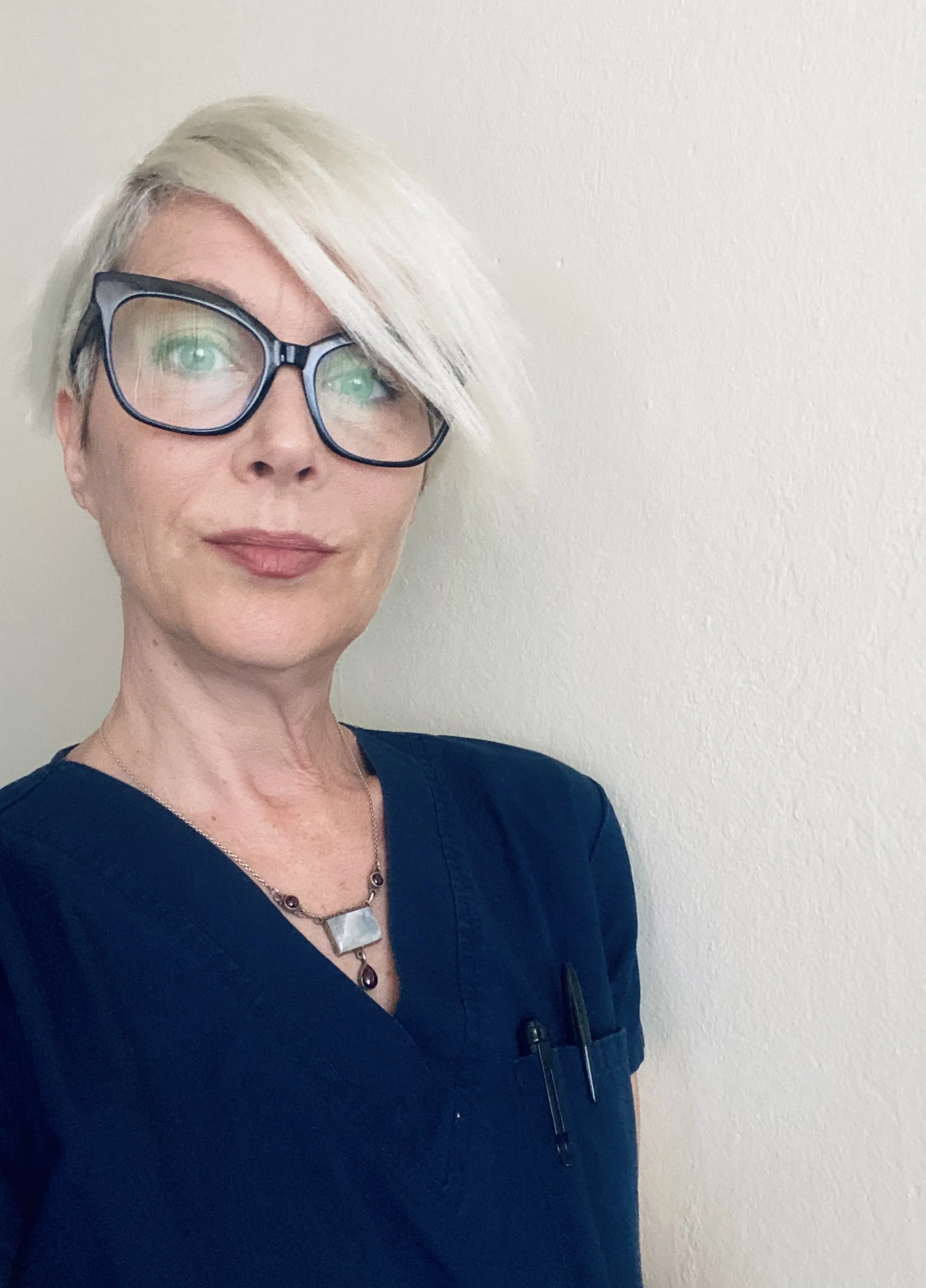 A portrait photograph of Dr. Allison Lubas