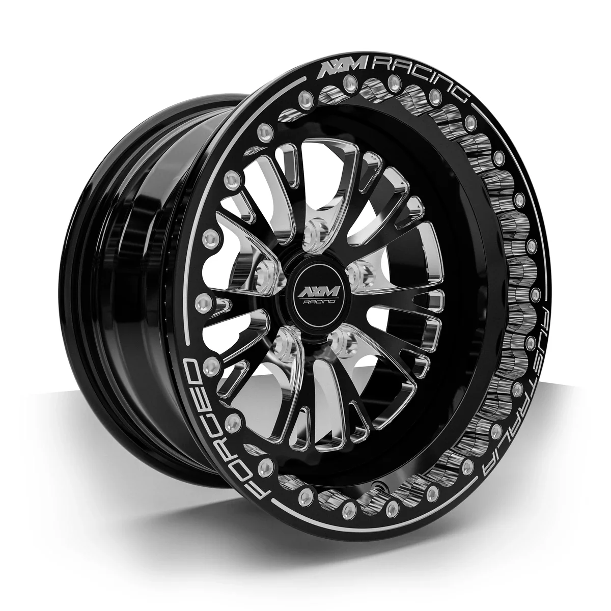 AXM Racing AXR-01 Type A forged rear drag wheel in black with machined accents — three-quarter view