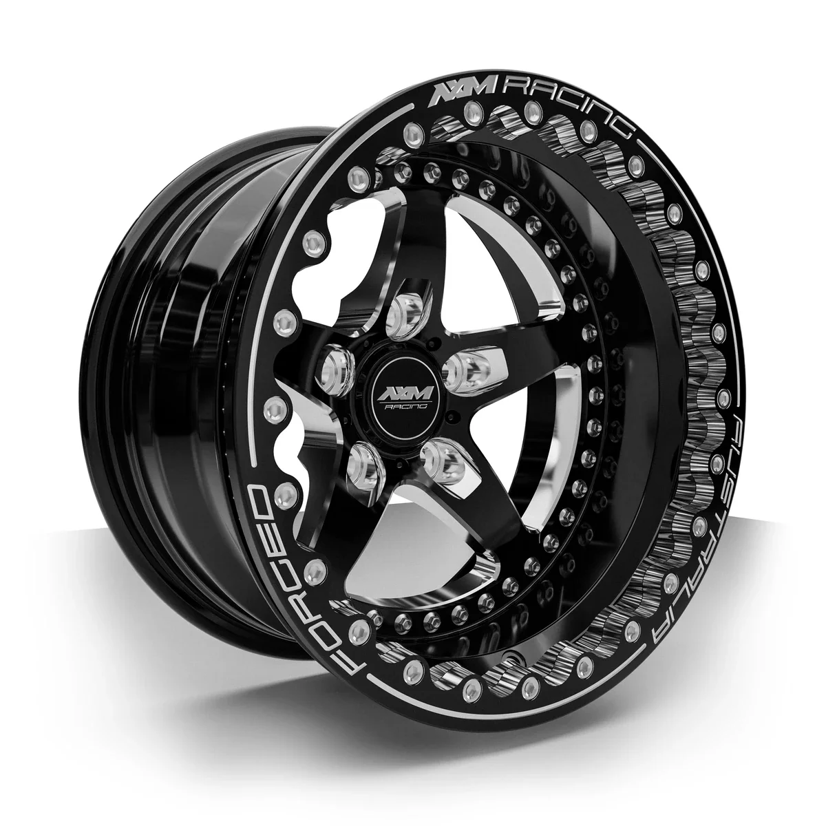 AXM Racing AXR-02 Type B forged rear drag wheel in black with machined accents — three-quarter view
