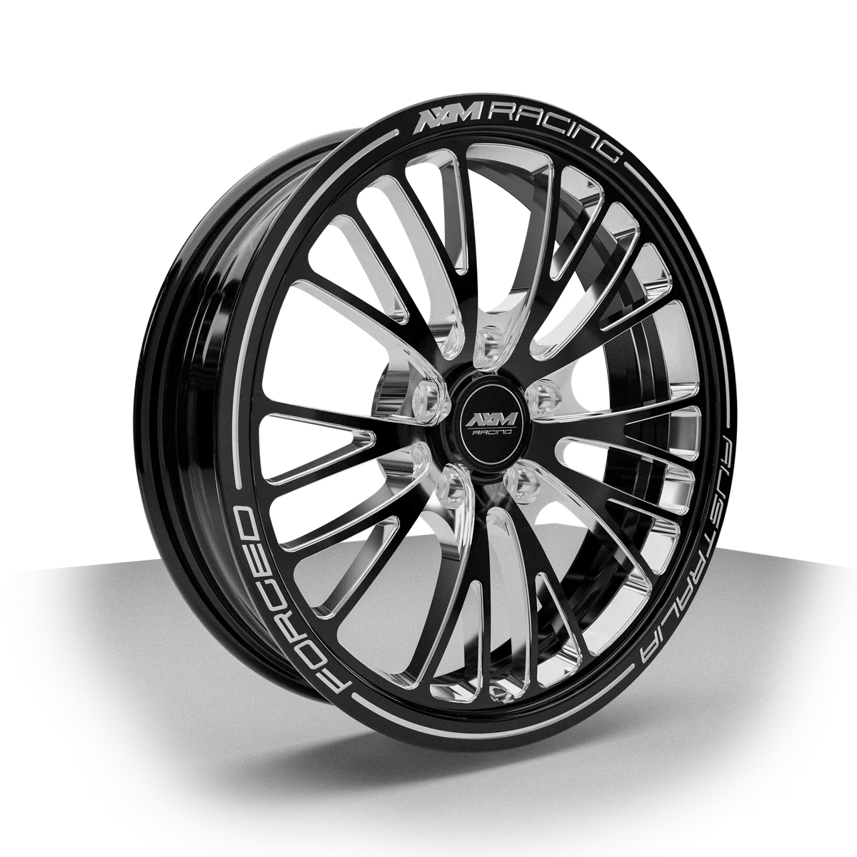 AXM Racing AXR-01 Front Runner billet front wheel in black with machined accents — three-quarter view