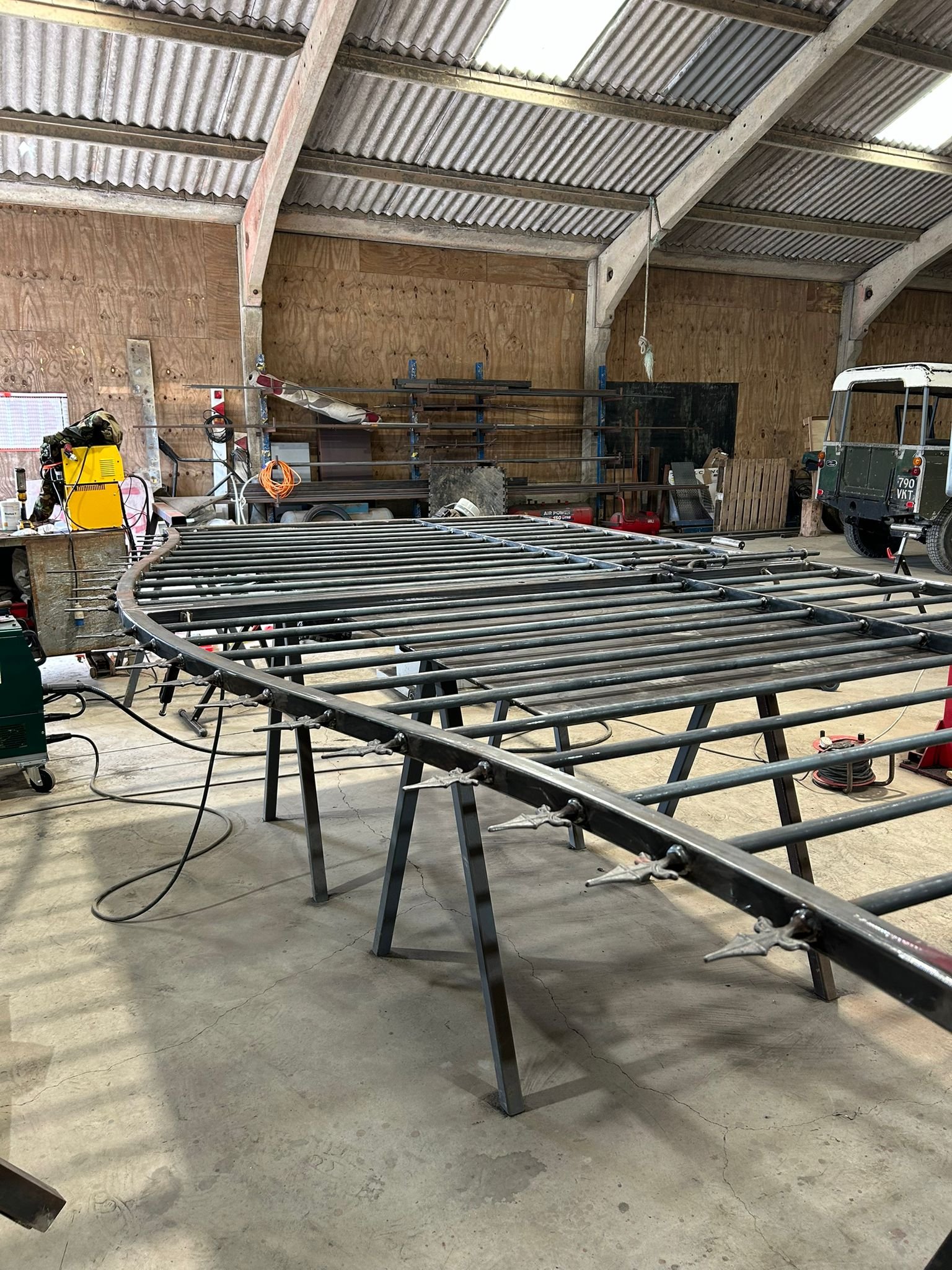 Decorative metal gate in workshop