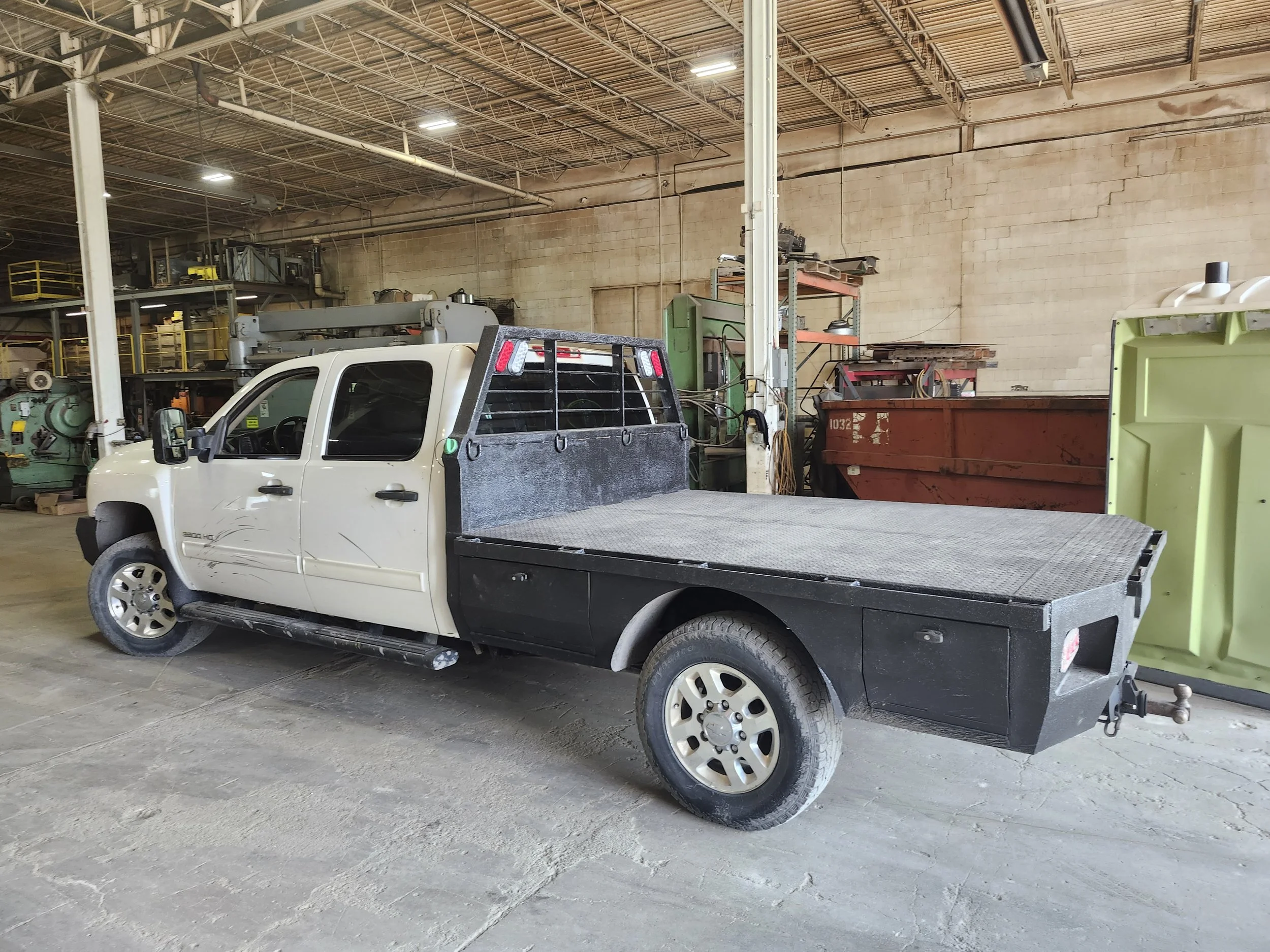 Truck Vehicle Outfitting with In-house Fabrication of Flatbeds, Truck Boxes, Trailers, Ladder Racks, Etc.