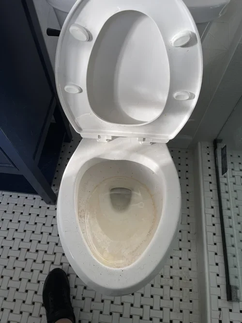 BEFORE - toilet stain build up, watch how we transform this on the next slide as part of our commercial cleaning service