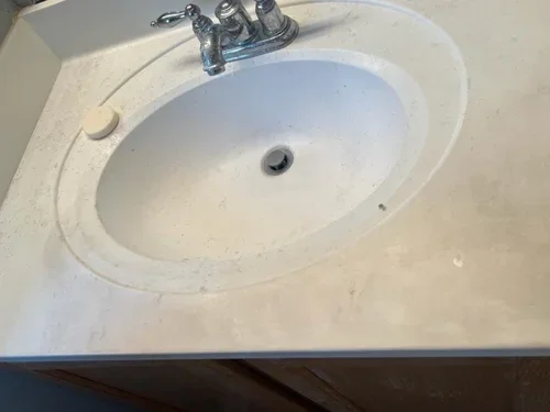 BEFORE - sink transformation as part of our residential cleaning service