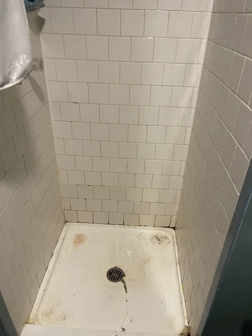 BEFORE - shower cleaning service as part of our Airbnb/Vrbo cleaning service