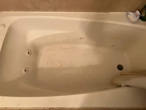 BEFORE - Bath tub cleaning as part of our Airbnb/Vrbo Cleaning Service