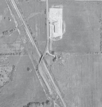 Aerial shot of the L&EP Humpback bridge, c1960s. ODOT aerial archive. The maintenance garage of All Saints Cemetery can be seen at the top.   