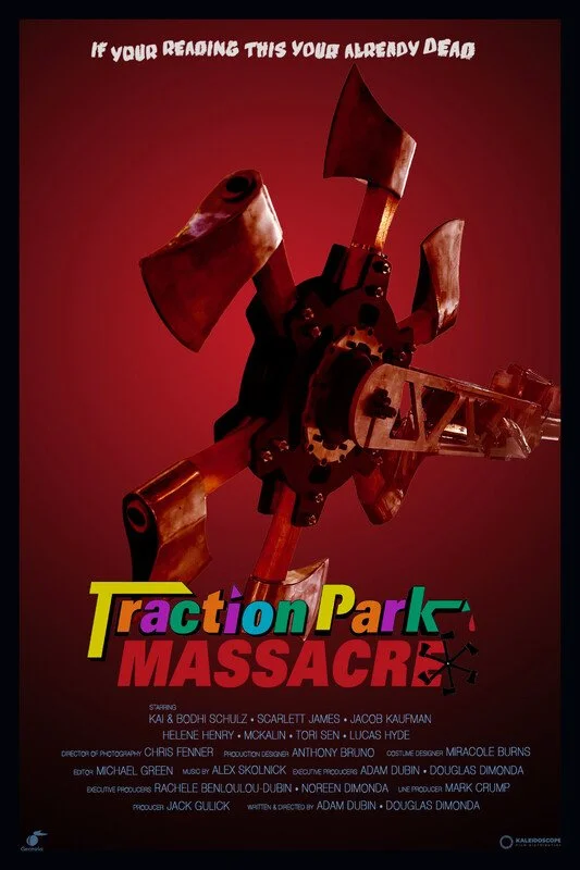 A poster for a horror-themed attraction called "Traction Park Massacre" with a dark red background and a mechanical, propeller-like object in the center resembling a self-destructive machine. The poster includes the tagline "If you're reading this you're already dead" at the top and lists the cast, crew, and production team at the bottom.
