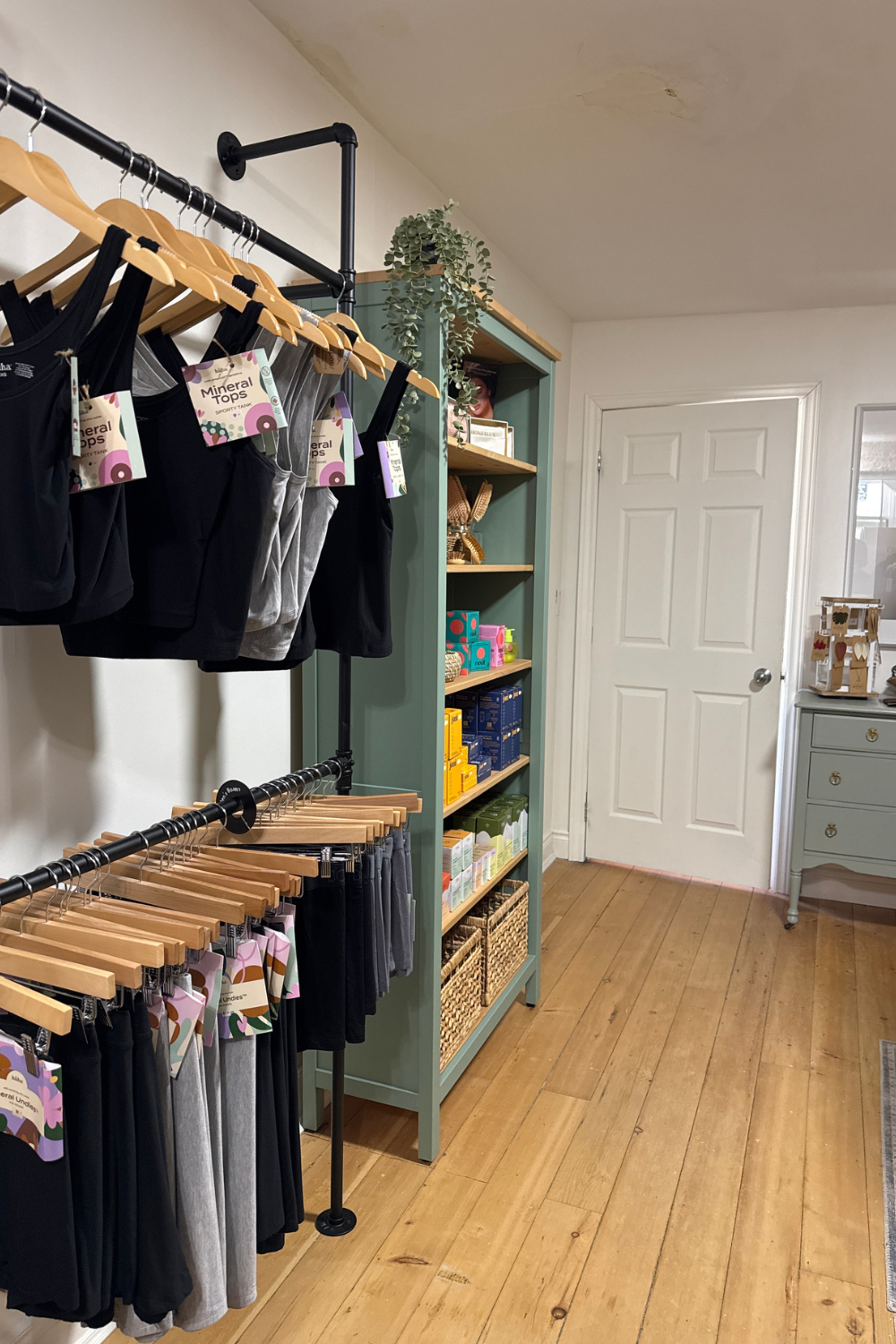 Clothing racks holding bamboo leggings and tops