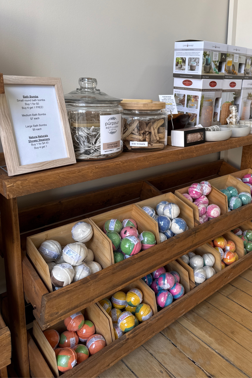 A shelving unit filled with bath bombs 