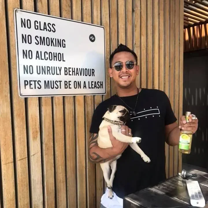 Will enjoying time with his dog in a relaxed outdoor setting, reflecting an active, friendly, and people-focused lifestyle