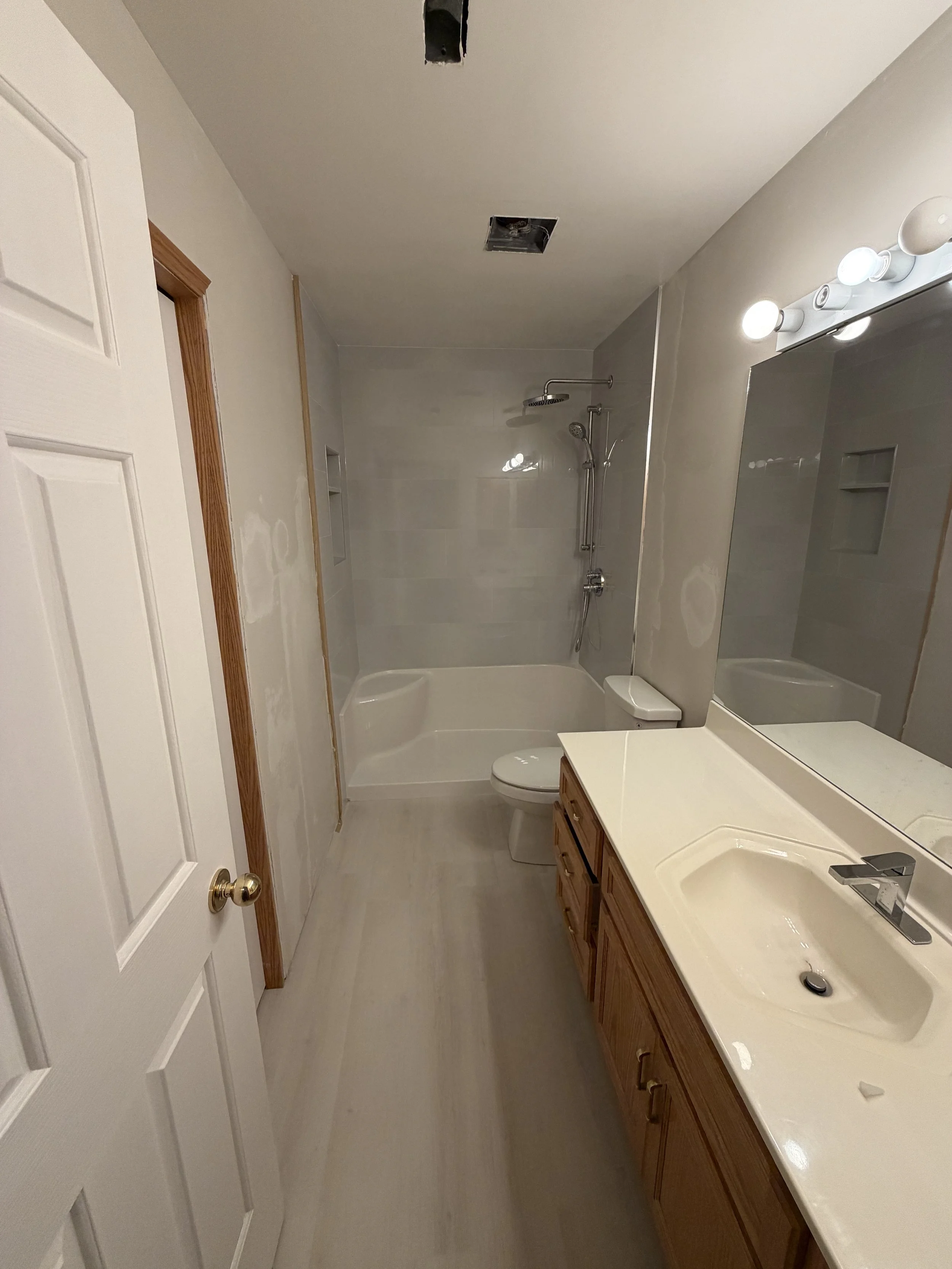 Installed finishes and tile is grouted
