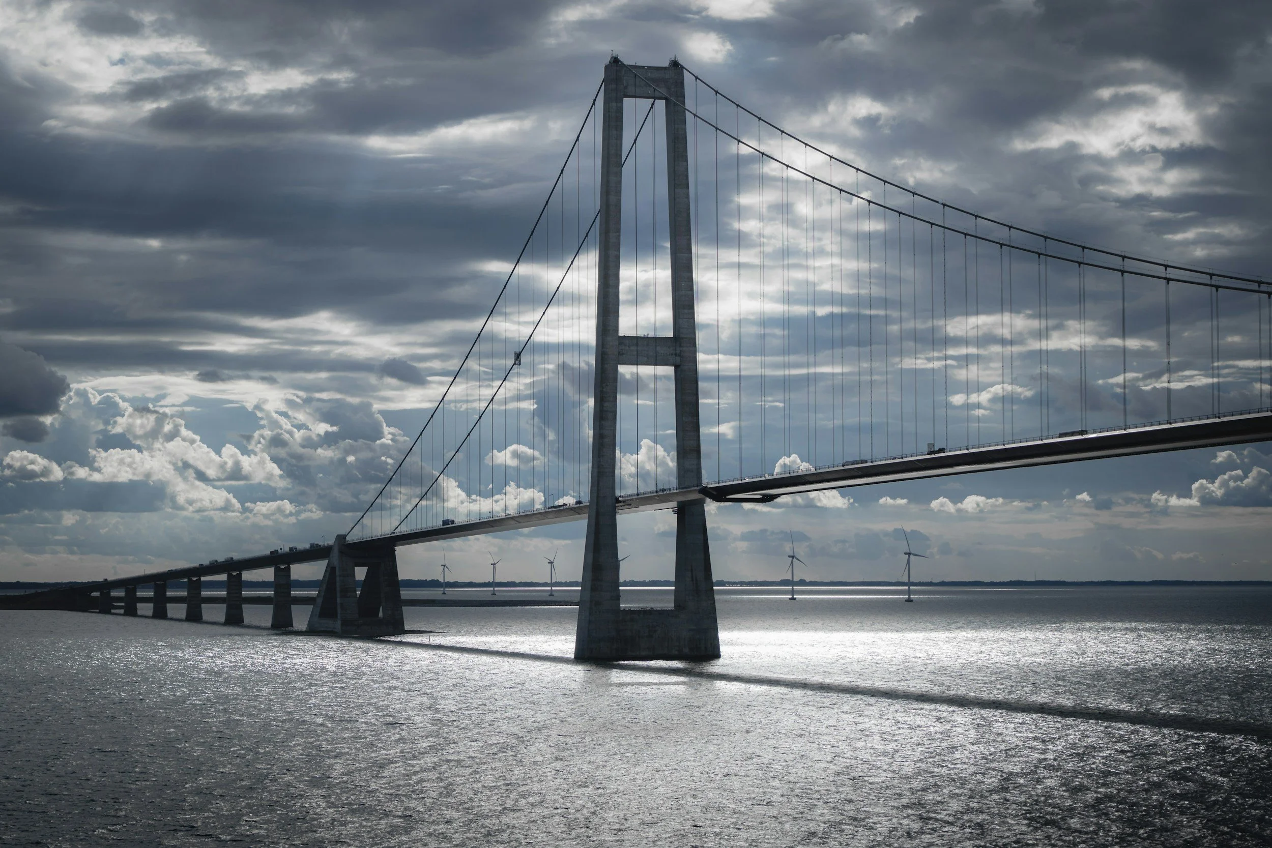 Transfer over Oresund bridge between copenhagen and malmo  under clouds.