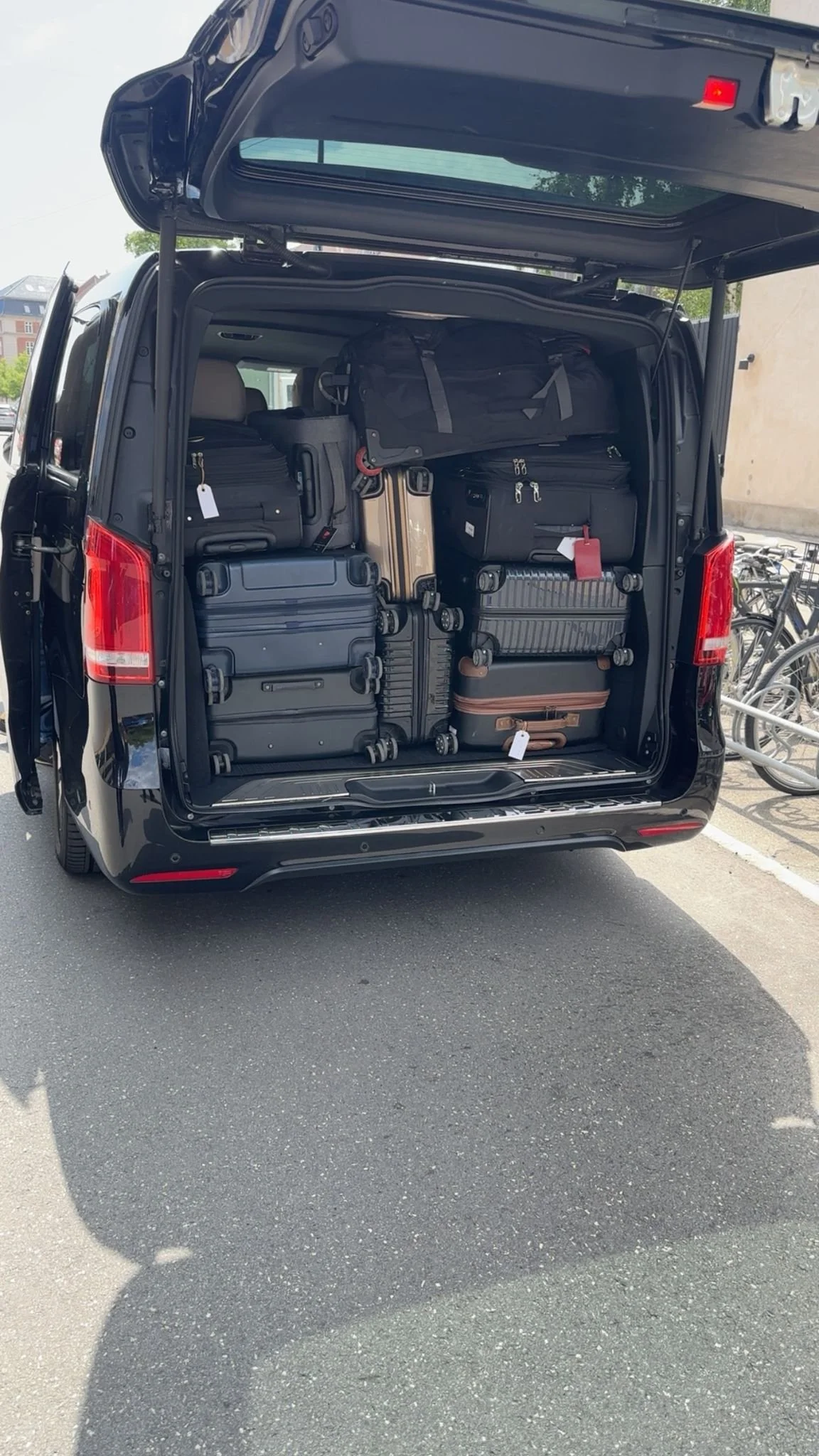 Mercedes luxury van baggage room filled with suitcases, ready for a private transfer to Copenhagen cruise terminal
