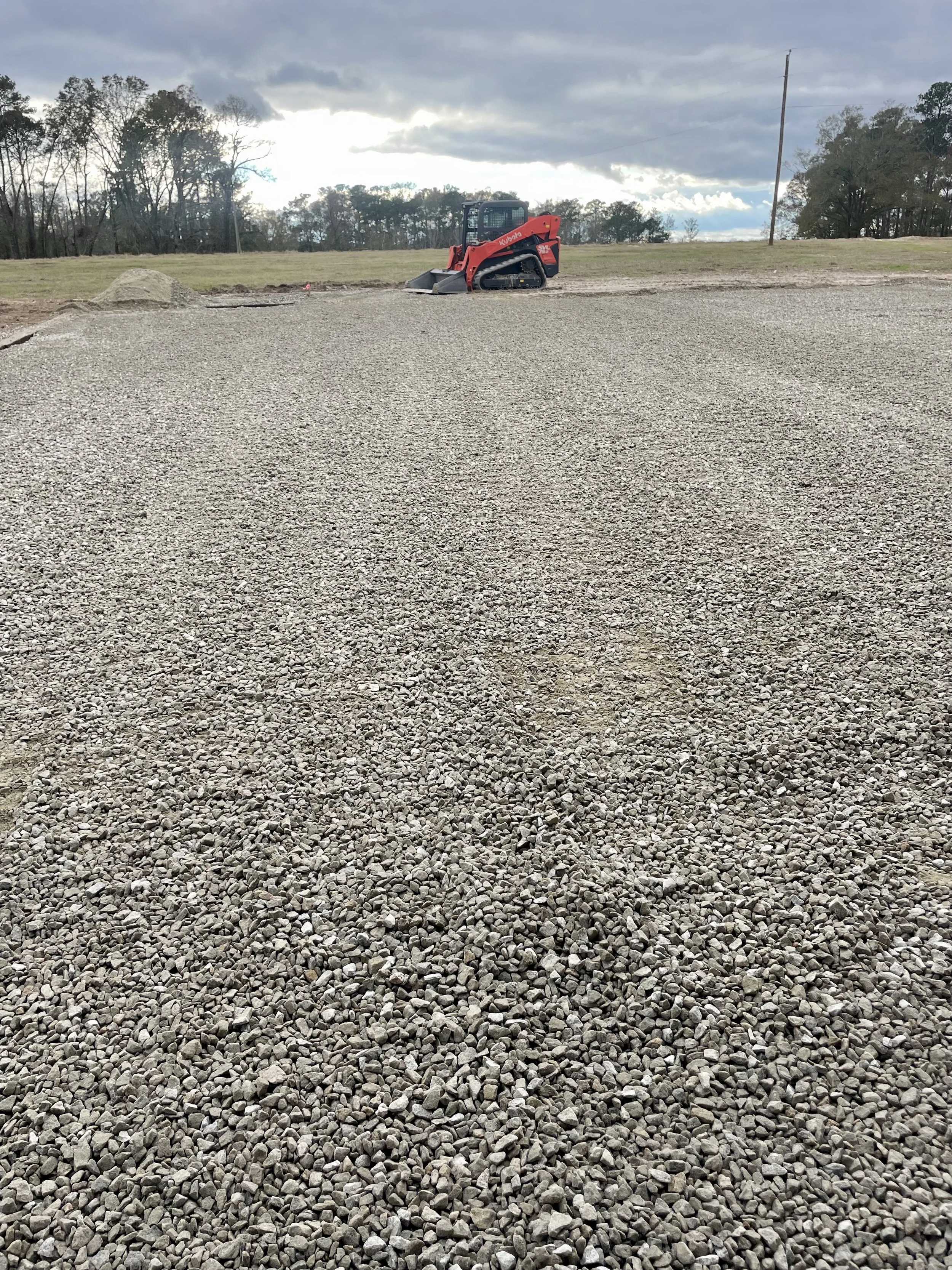 Gravel driveway and culvert installation by Triple H Property Development near Troy  Alabama