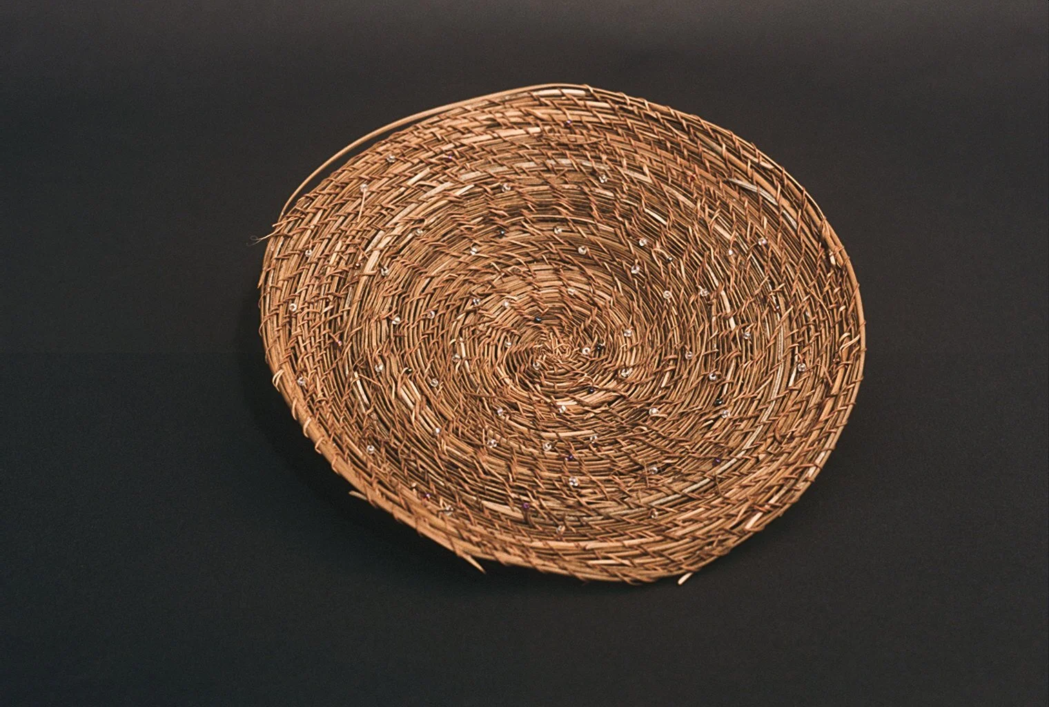 Hand-made pine needle basket with glass seas beads