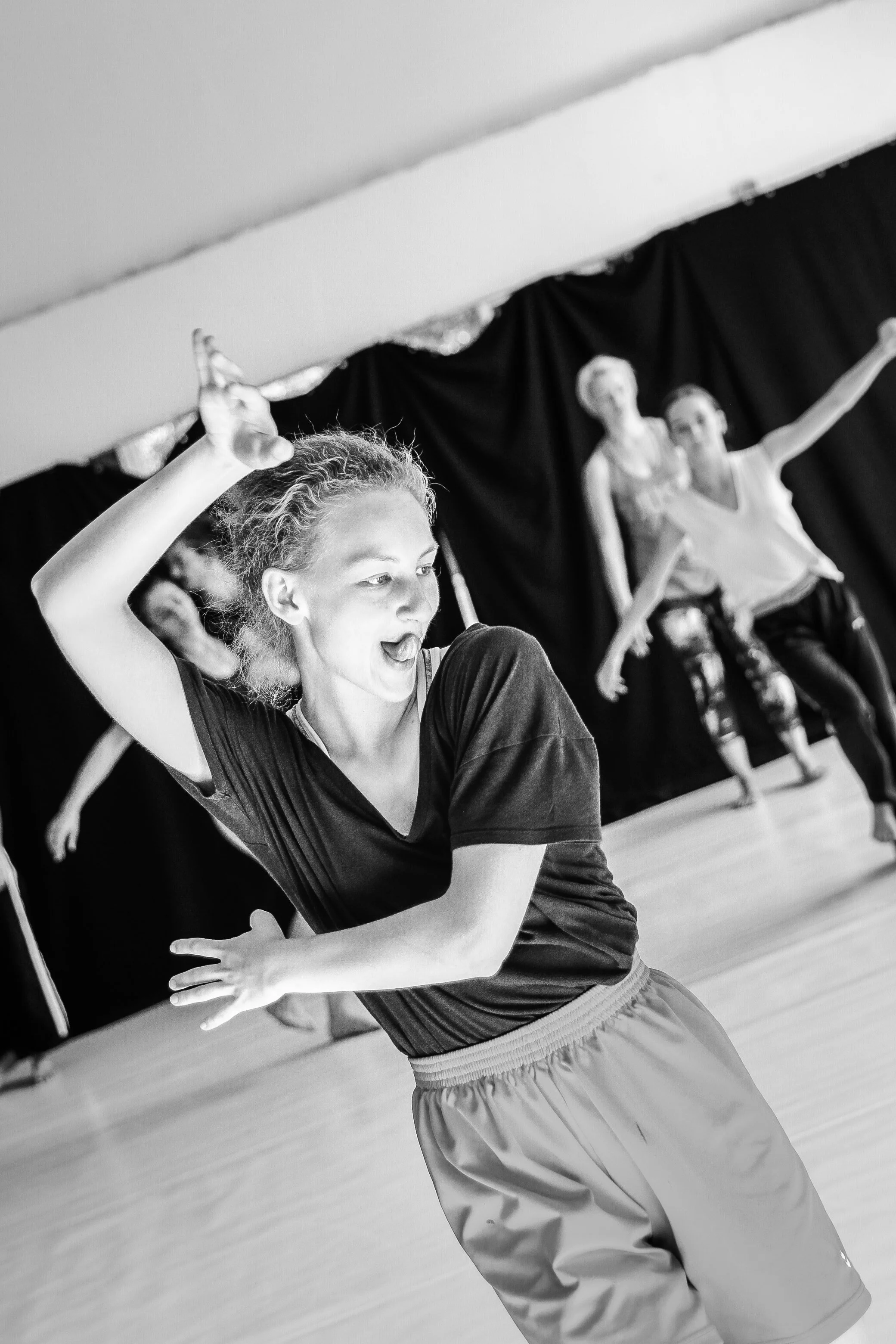 Lizard Beats at International Dance Week Budapest 2016: a participant mid-movement, one arm raised over the head
