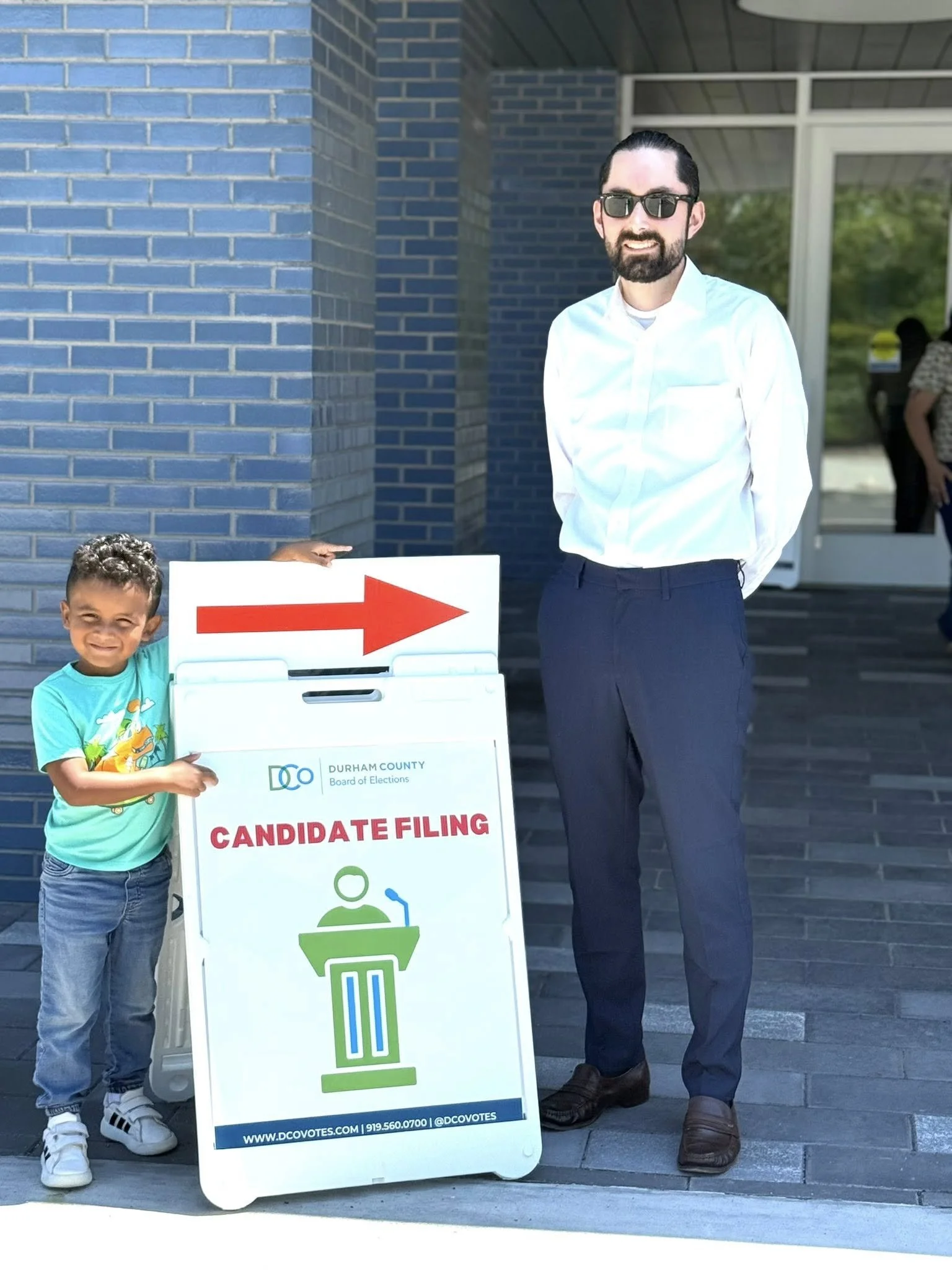 Pablo Friedmann signing up at Durham City Hall to run for the 2025 Mayoral Race