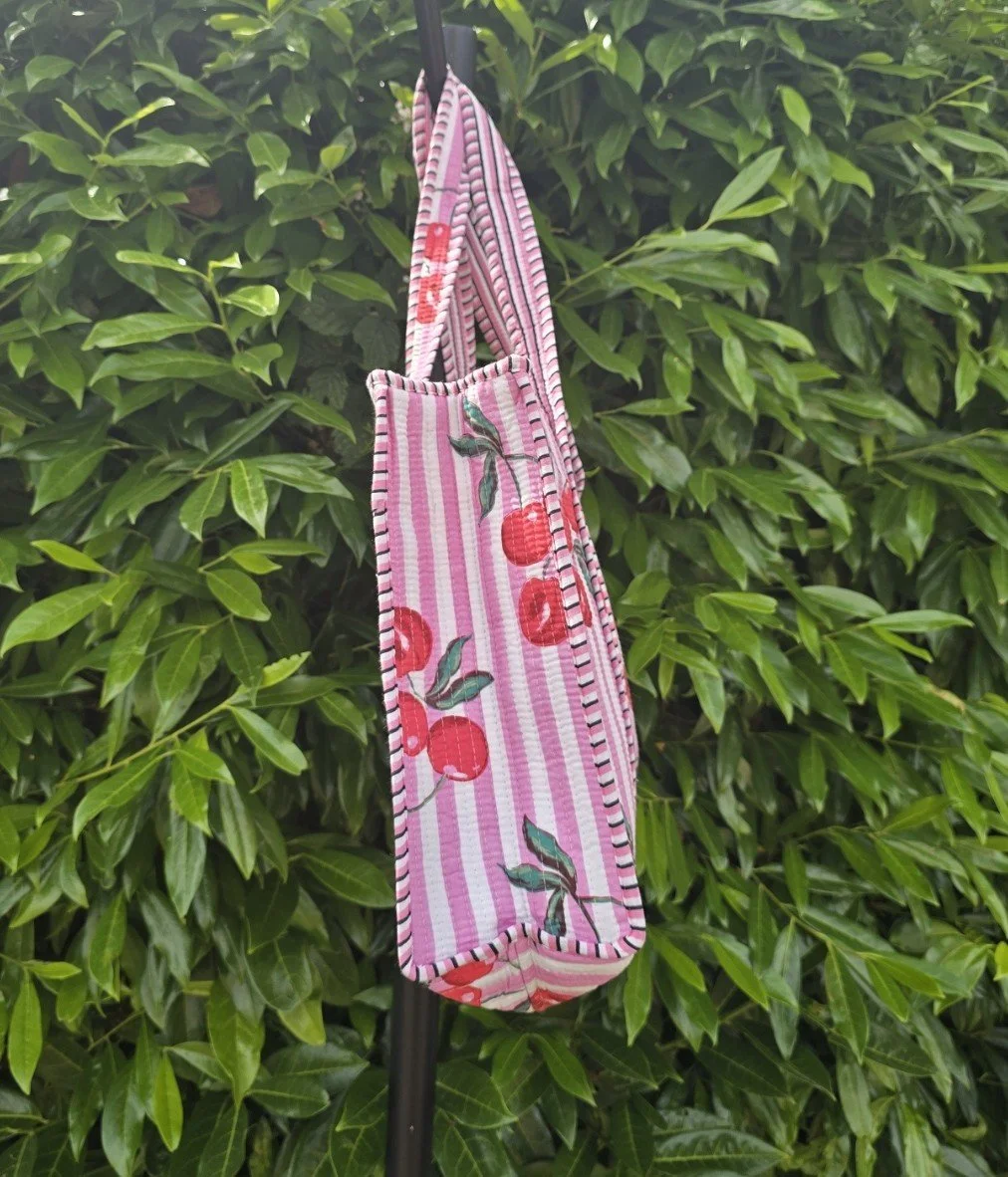 Cherry on pink w zip  side.jpg