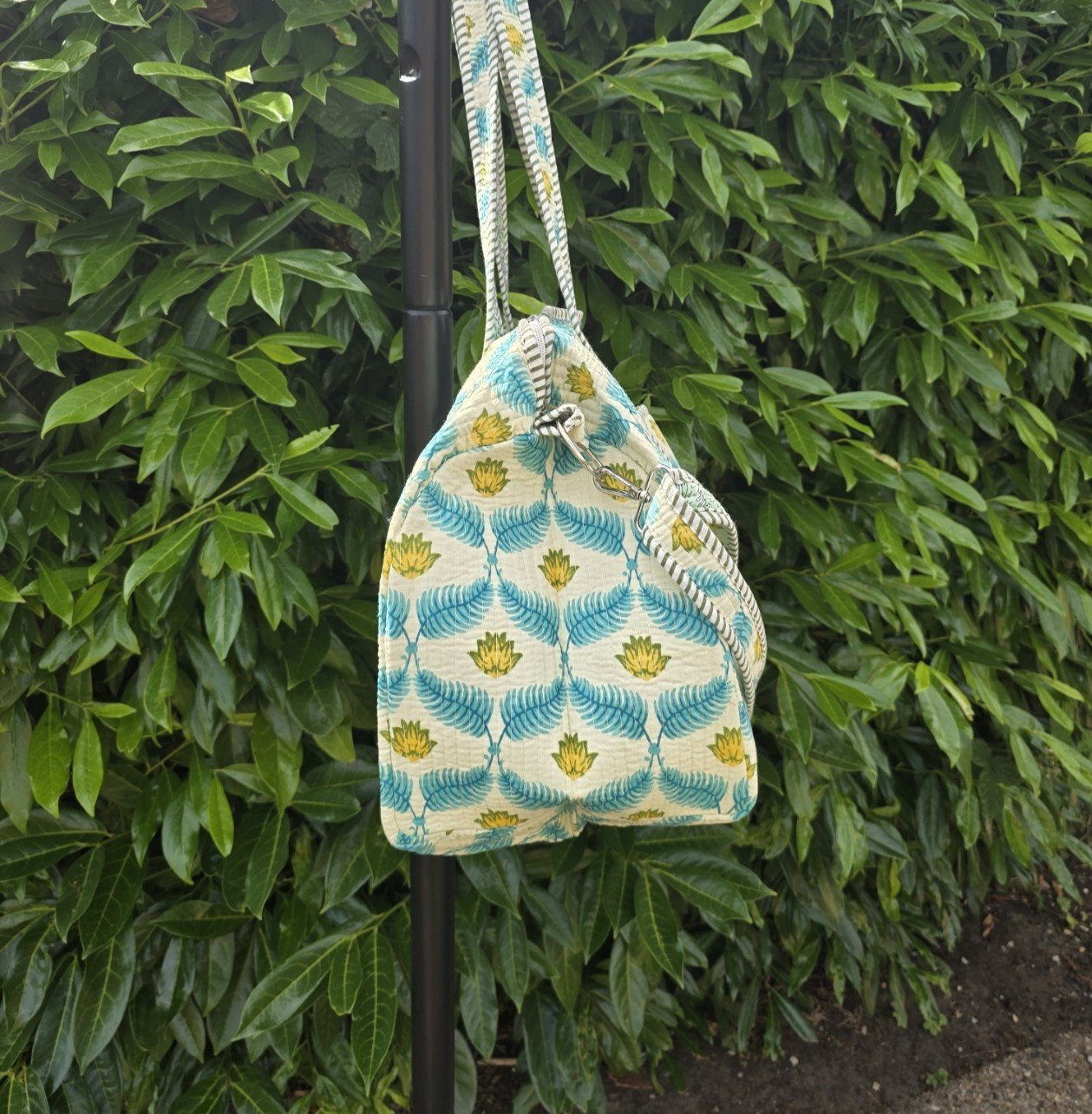 FEATHER Duffel side.jpg
