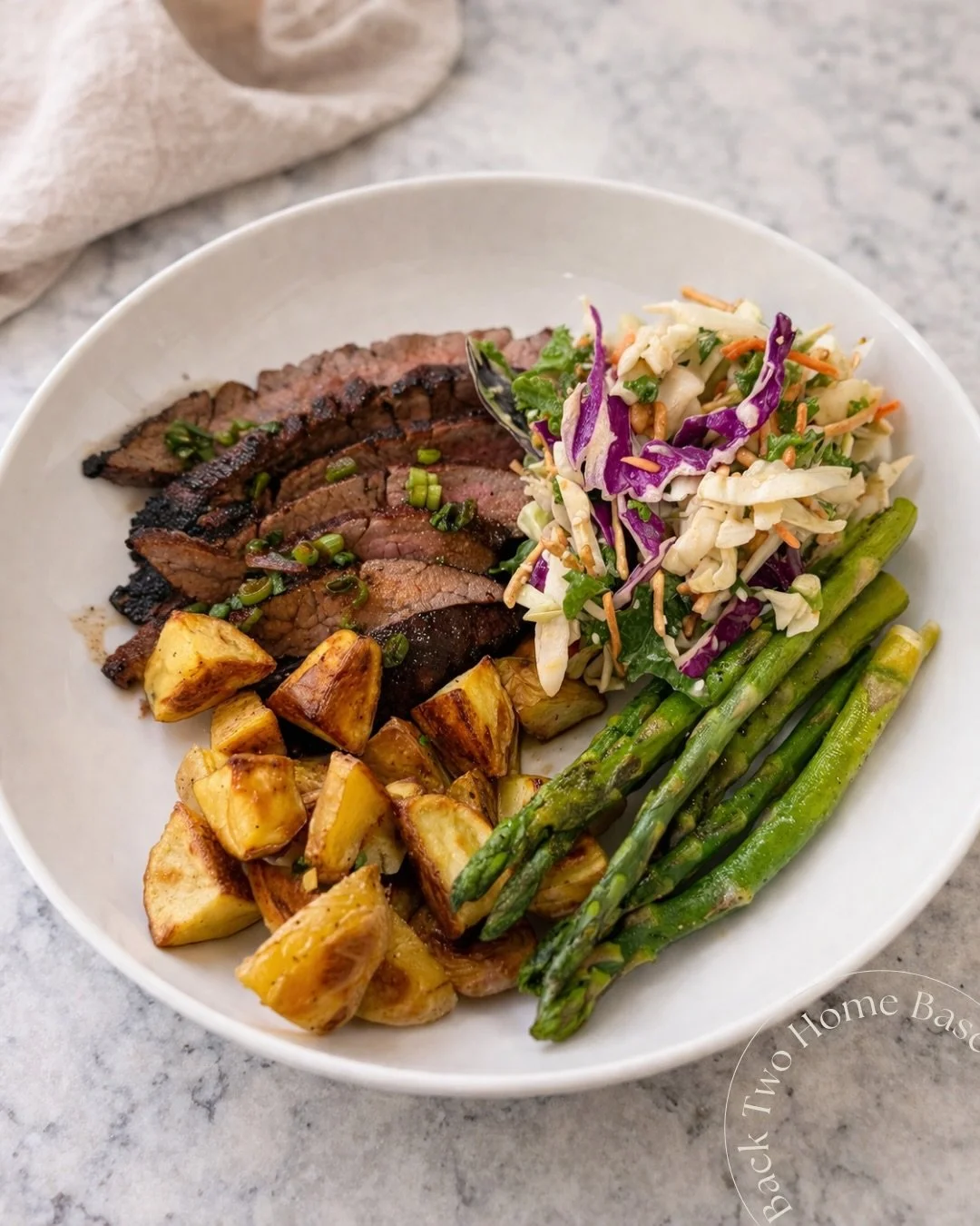 Steak night just got a serious upgrade. 🥩

This soy marinated flank steak is one of those recipes I keep coming back to! And lately I have been switching soy for coconut aminos, a nice touch!

Plated it with roasted potatoes, grilled asparagus, and 