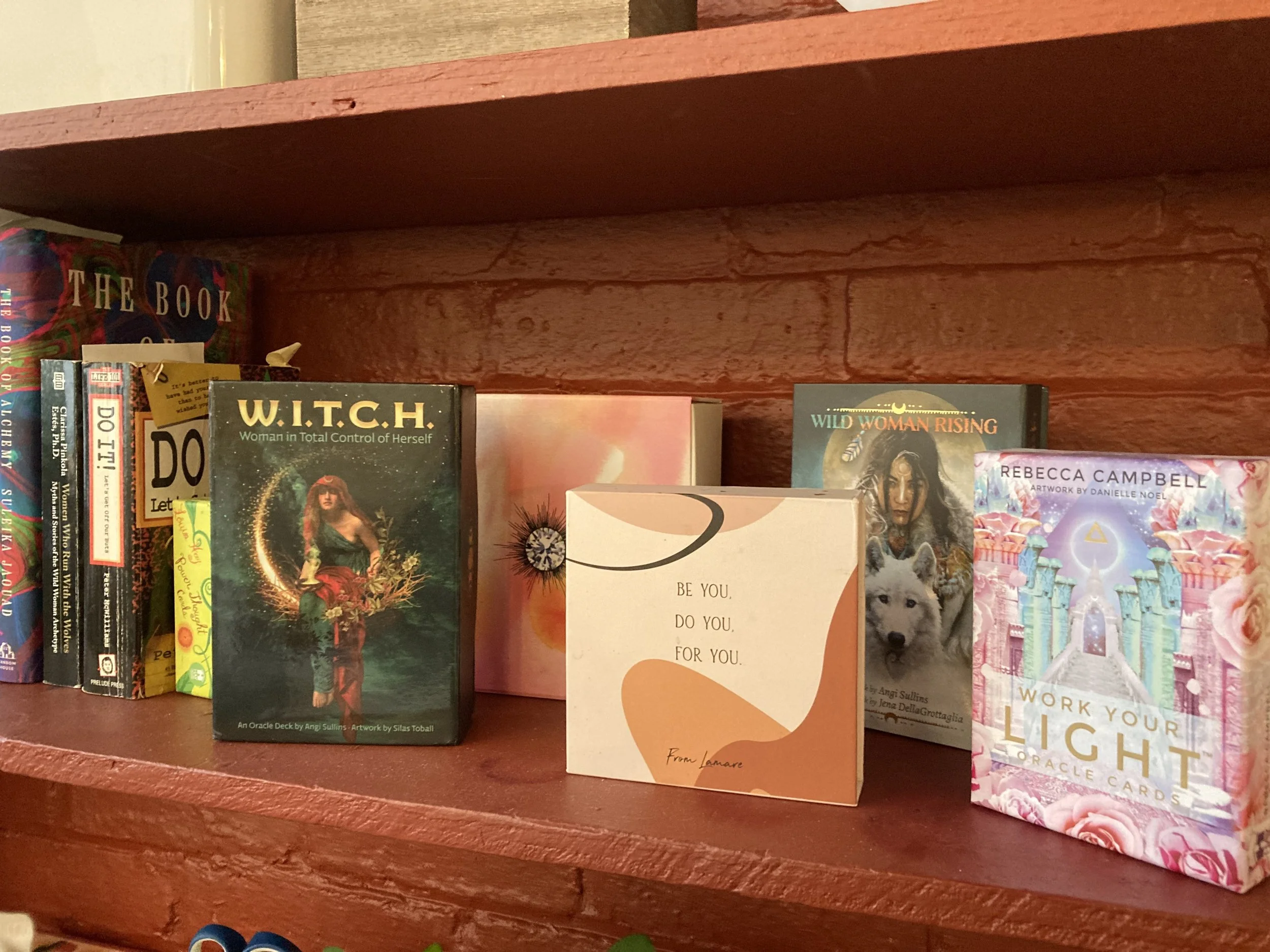 oracle decks on a shelf