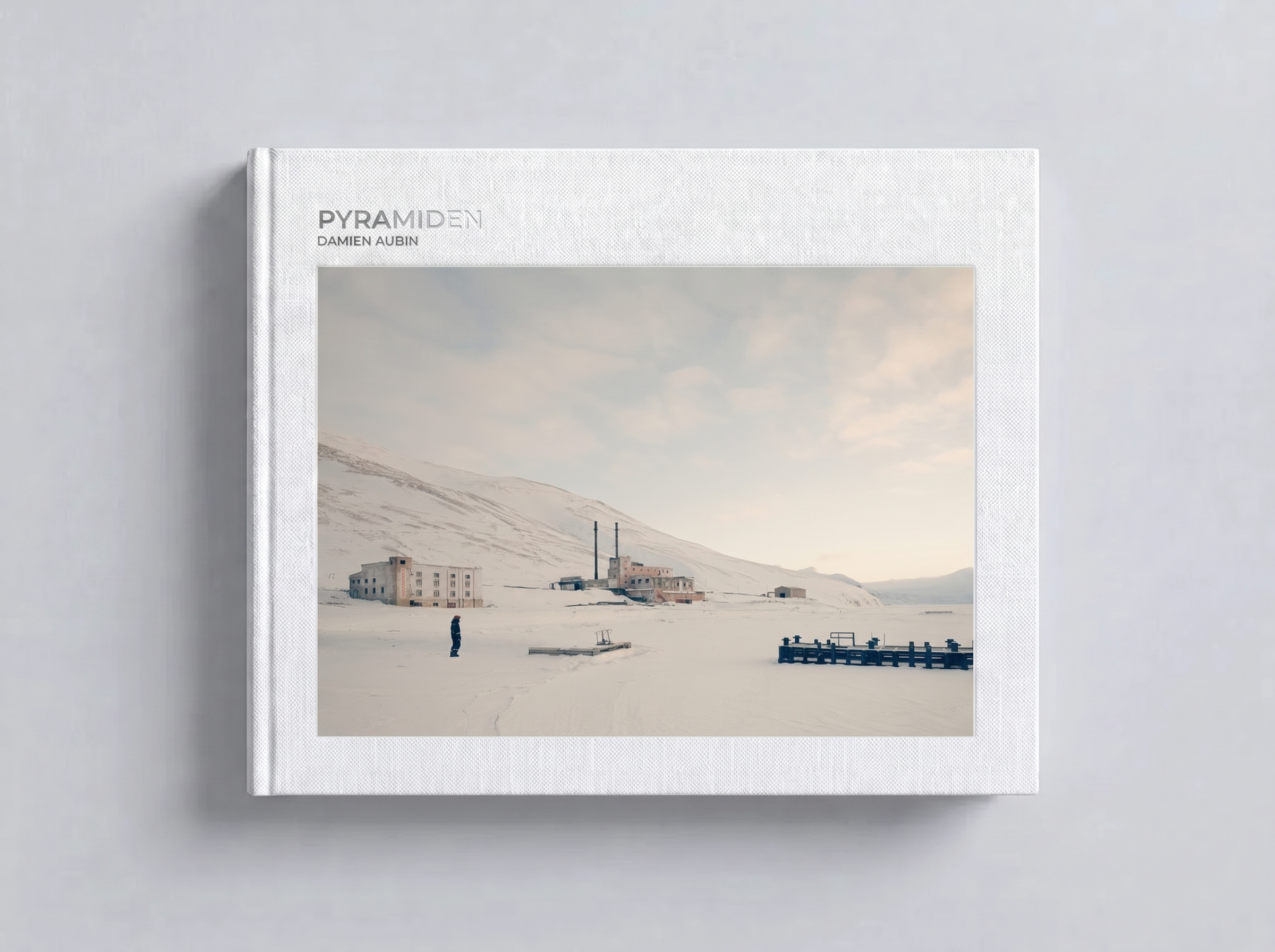 Cover of the Pyramiden photobook by Damien Aubin — abandoned Soviet mining town in Svalbard