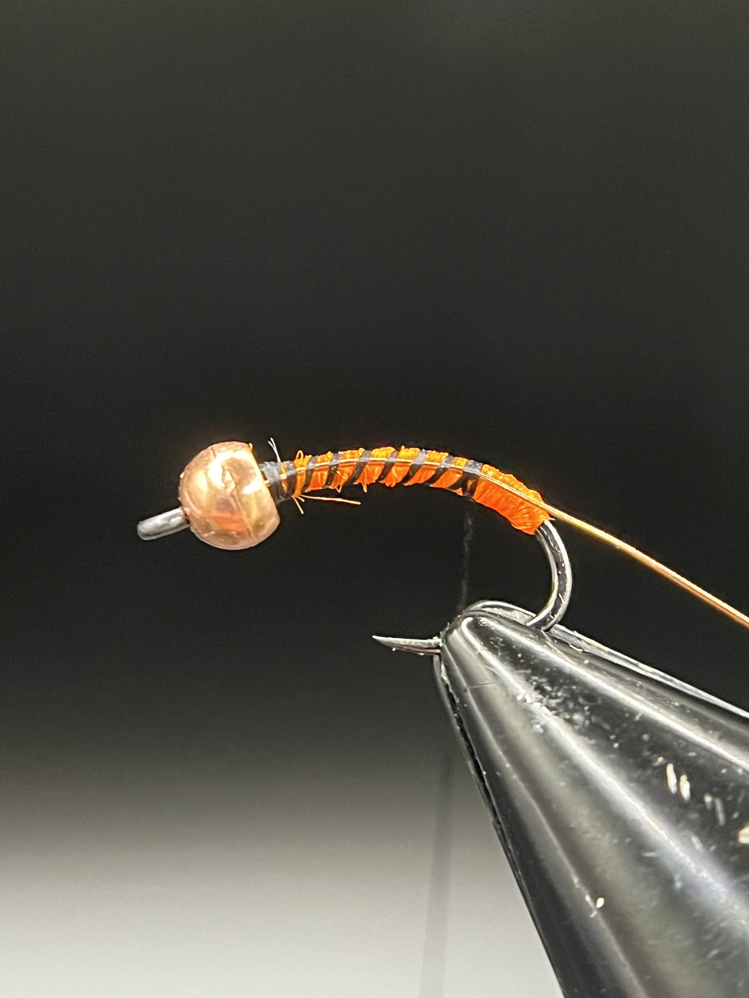 Tie in a length of copper wire and tie back to about 2mm short of the end of the floss