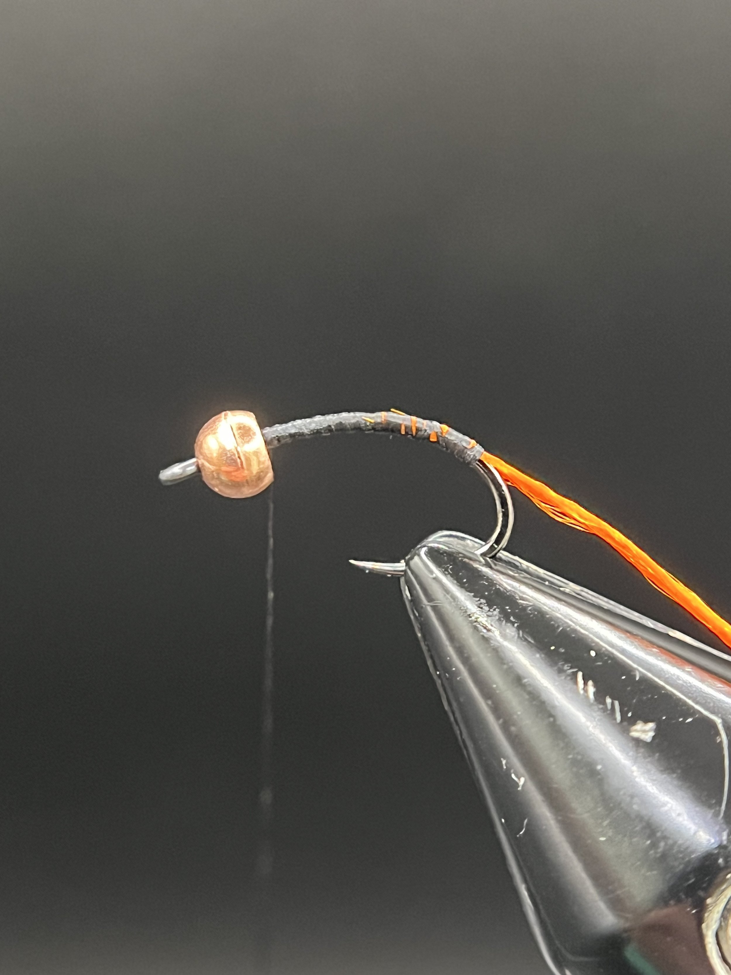 Tie in a length of orange floss