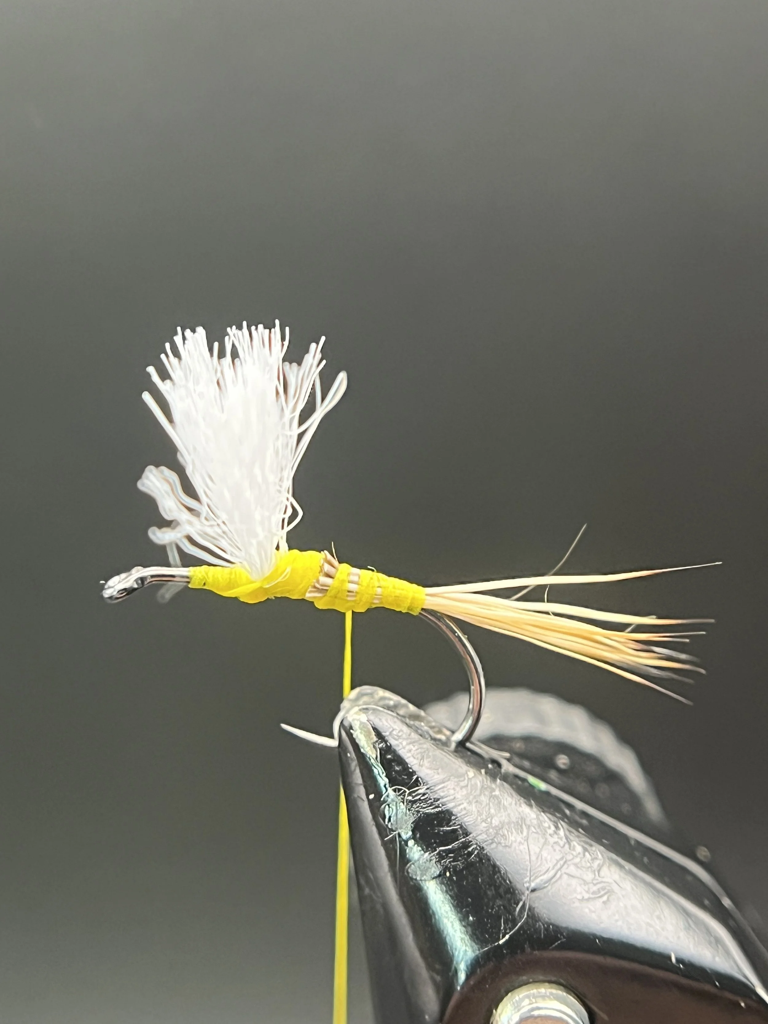 Stack a small bundle of elk hair and tie in to create a tail