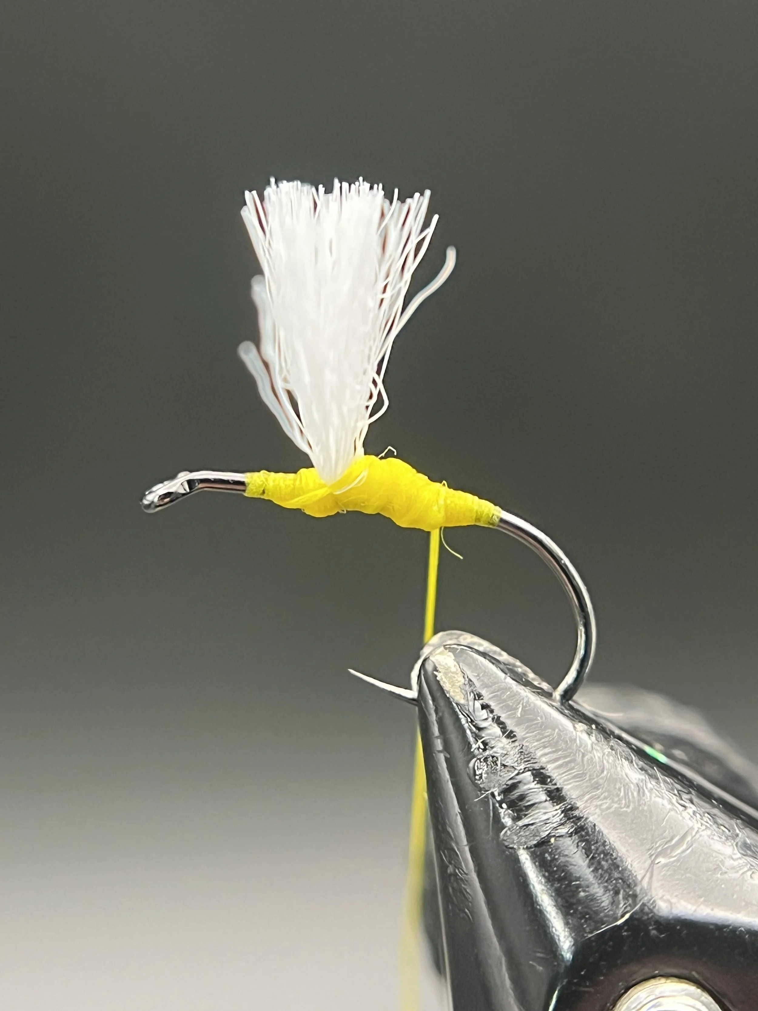 Post your wing upright by placing thread wraps in front of the yarn. Trim to length slightly longer than the hook gape