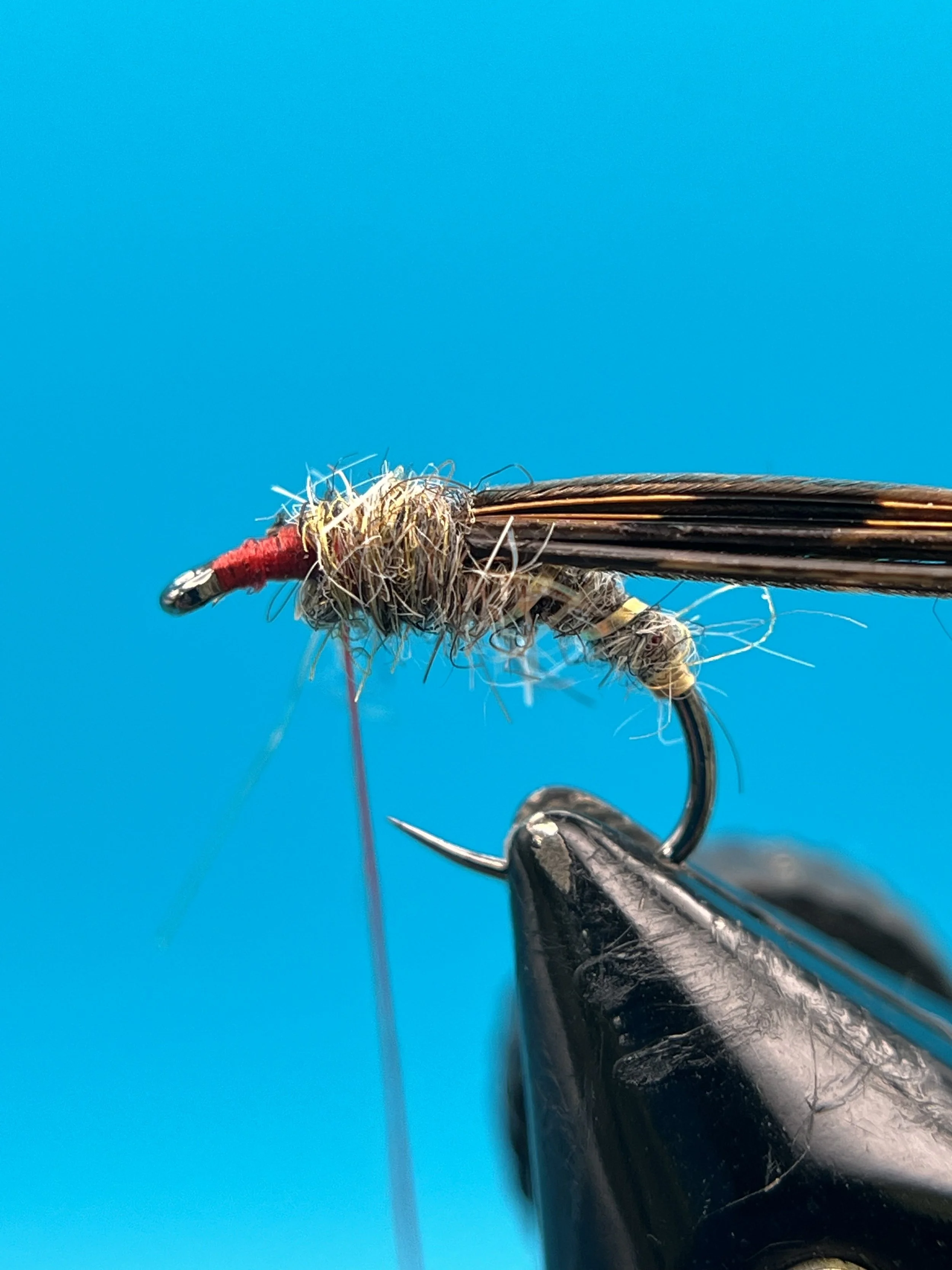 Dub a thorax with the same Nature's Spirit Hare's Mask dubbing (or experiment with a darker color for contrast)