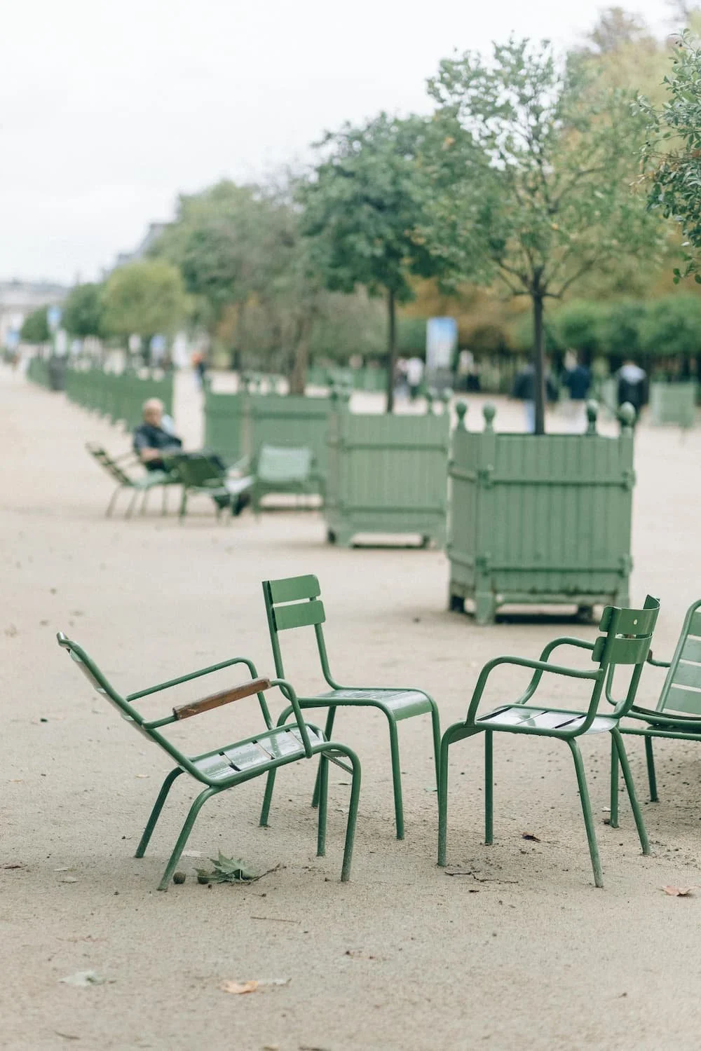 green chairs in park