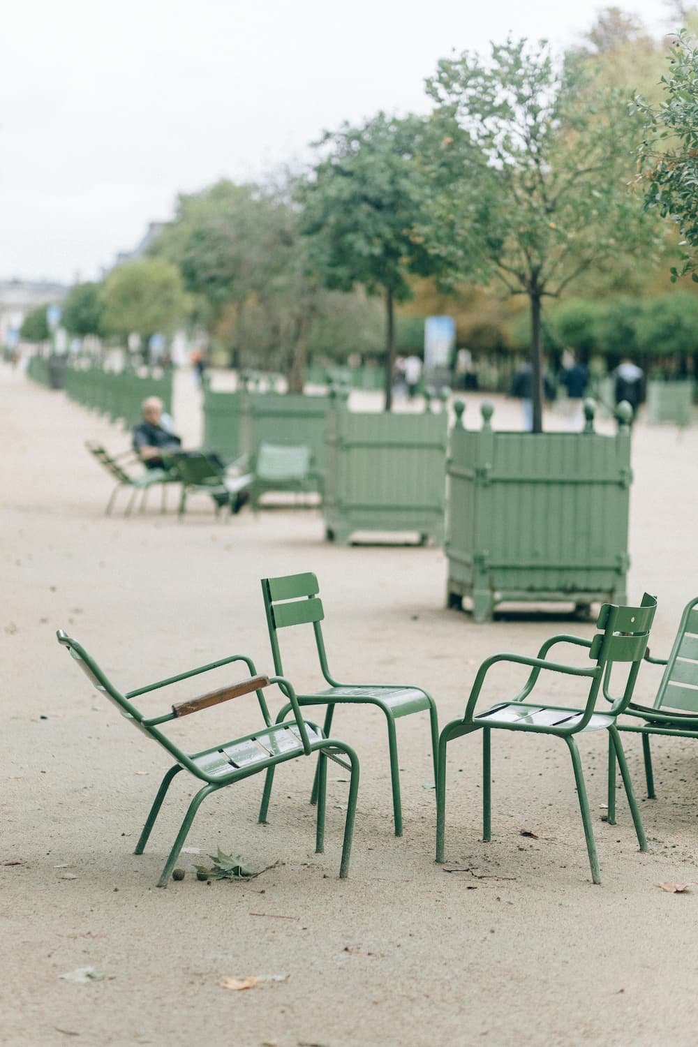 green chairs in the Luxembourg gardens in Paris