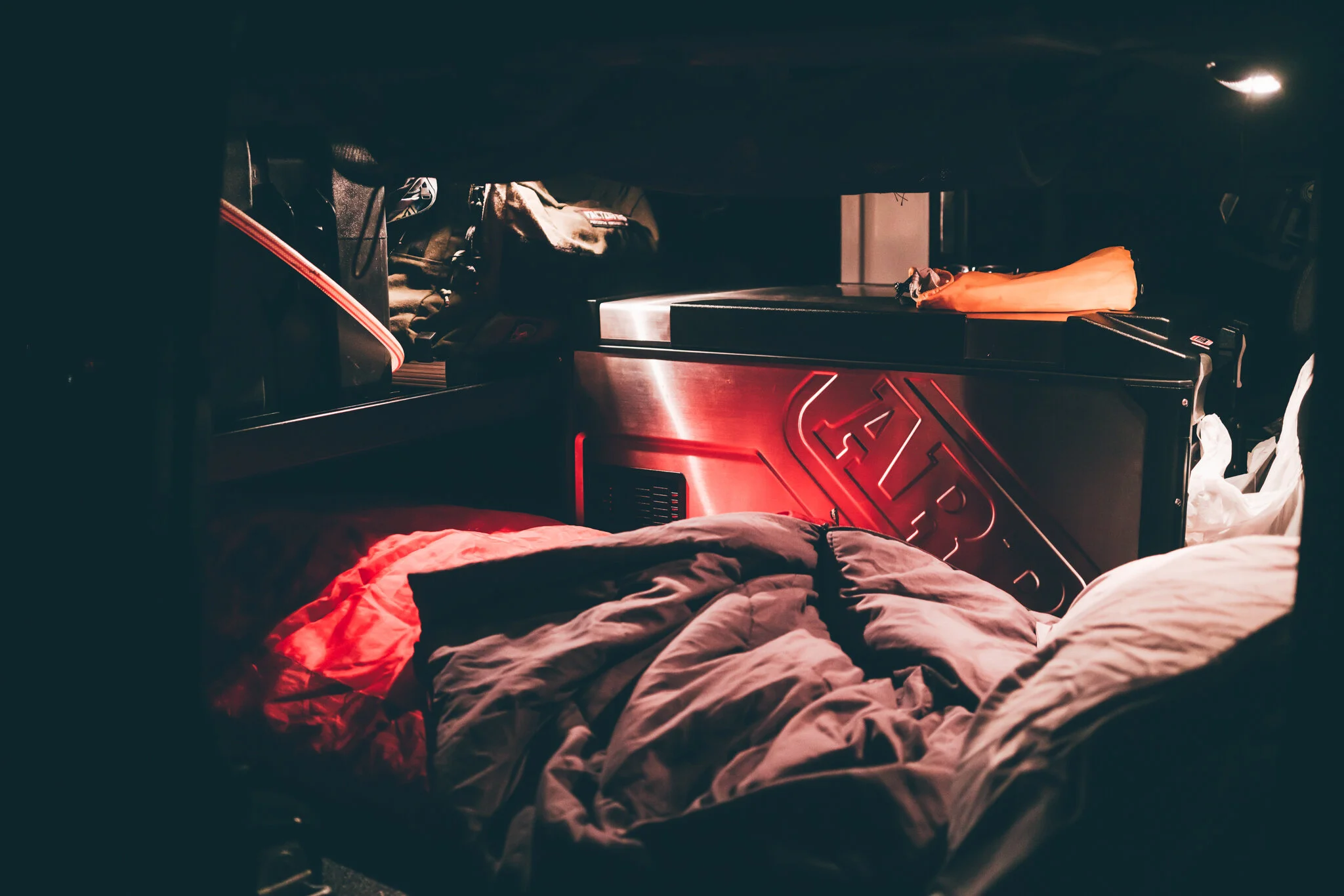 "Quarters" while sorting everything out on the Spanish coast. Basic but effective. I had a need to stealth camp in a city in mind when designing it, but when the weather is thrashing you, and you can't be bothered to set up in the rain, it is just as valuable.