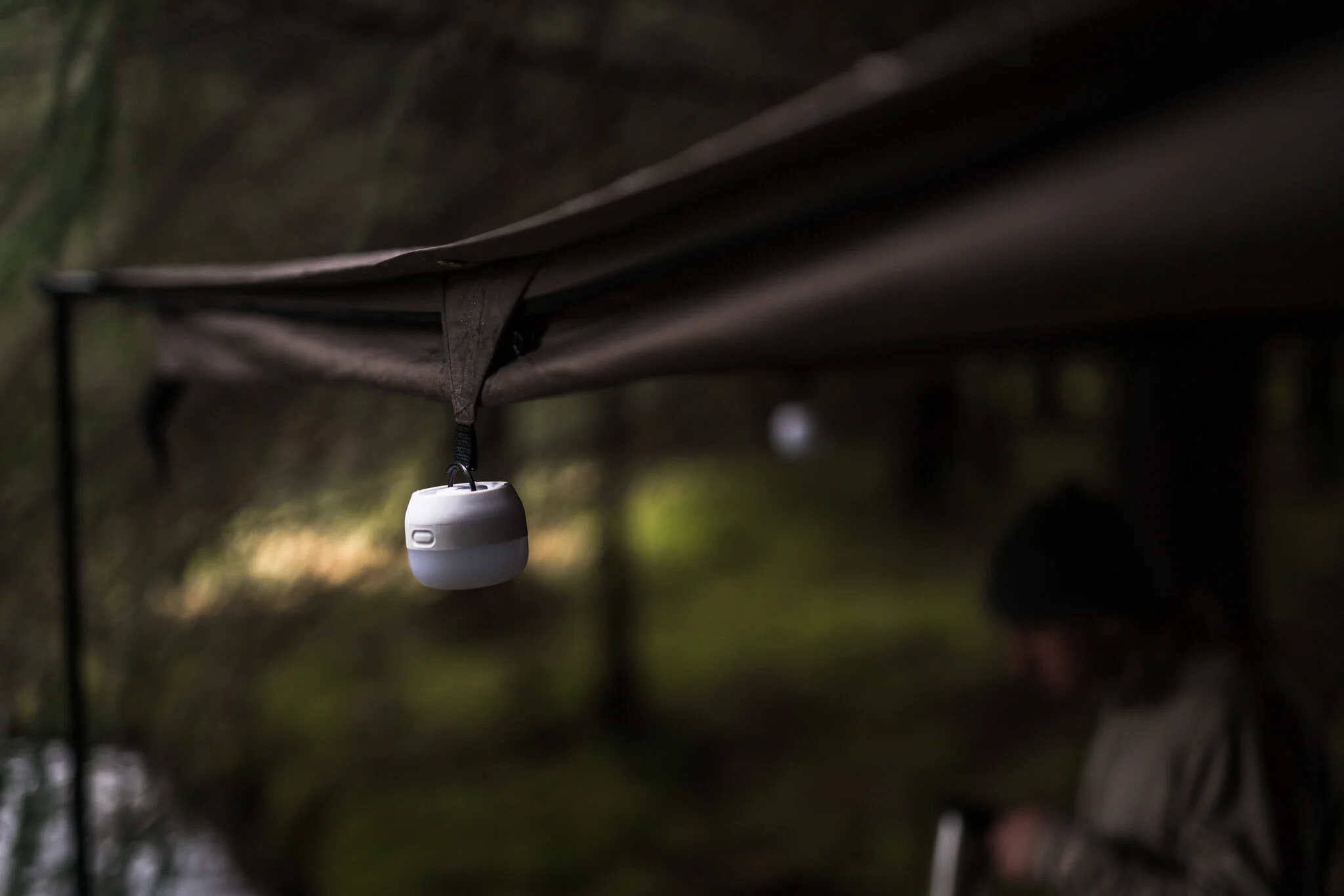 Worth considering some small lights like these from Black Diamond to hang from the guide loops!