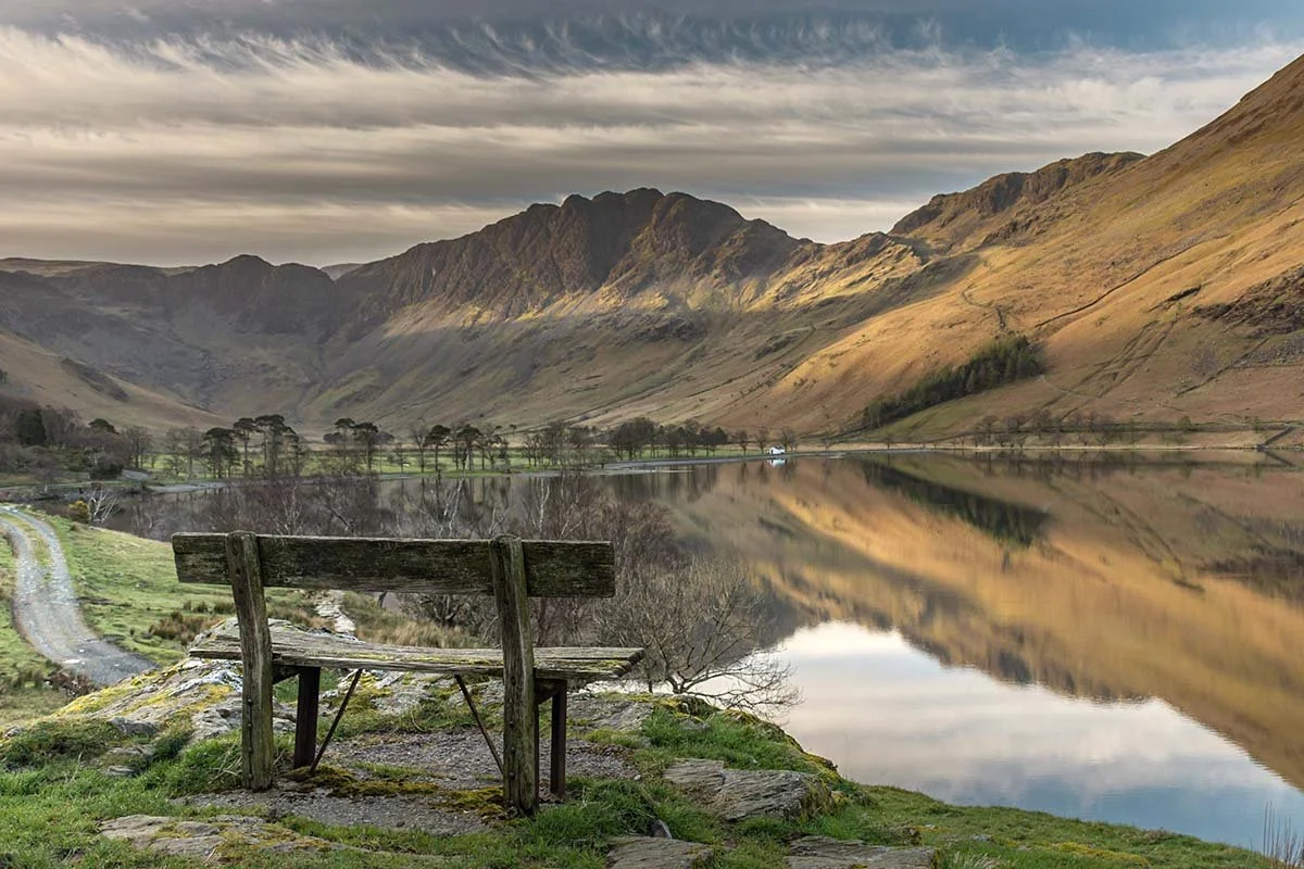 old wooden seat overlooking Buttermere and the Lake District fell, Haystacks