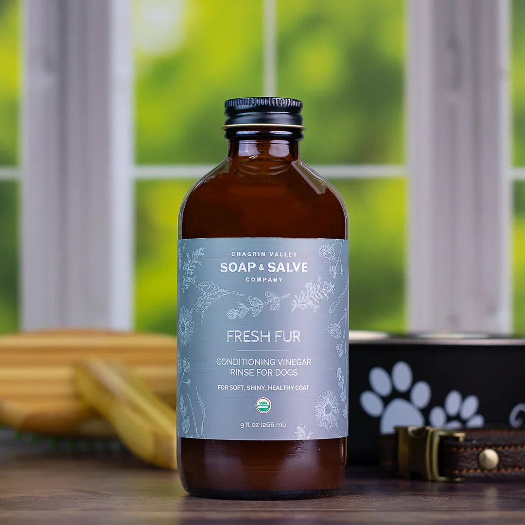 Organic apple cider vinegar dog rinse concentrate infused with herbal botanicals