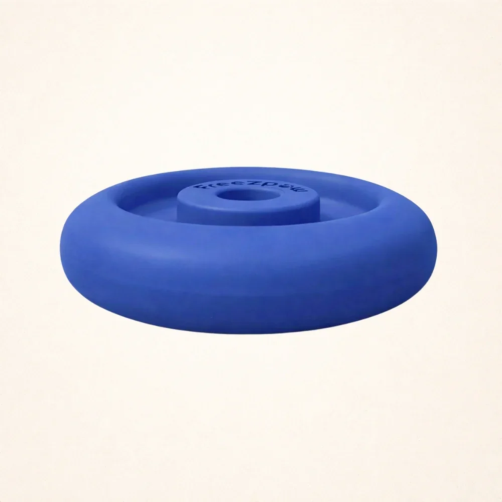 Blue circular object with a central hole, resembling a weight or fitness equipment, against a plain white background.